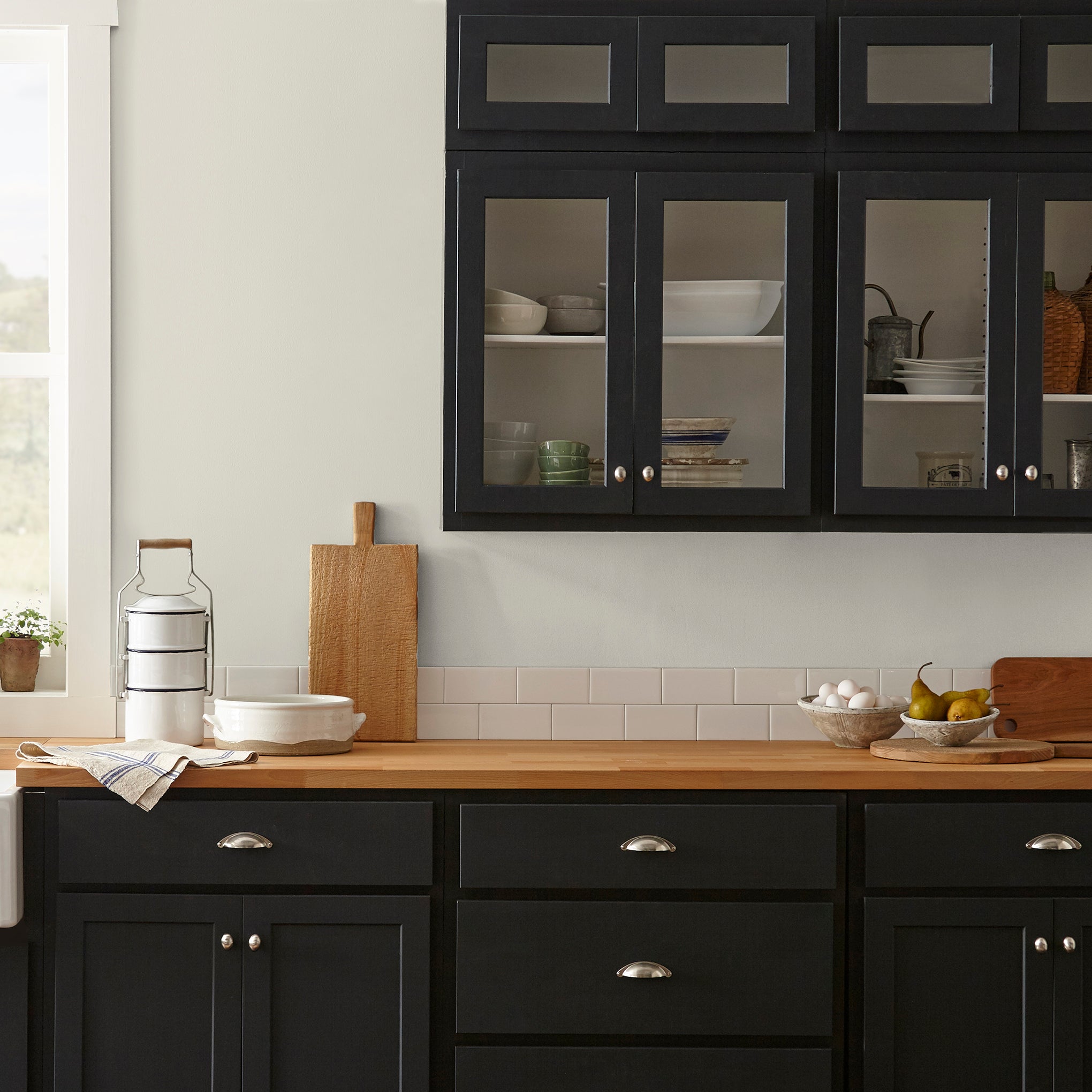 Warm white brushed with warm beige interior paint named locally sown shown painted on kitchen wall