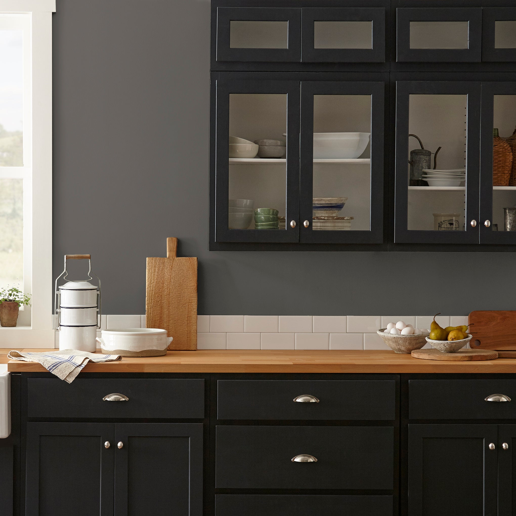 Deep brown with hazel and cocoa notes interior paint named repurpose shown painted on kitchen wall