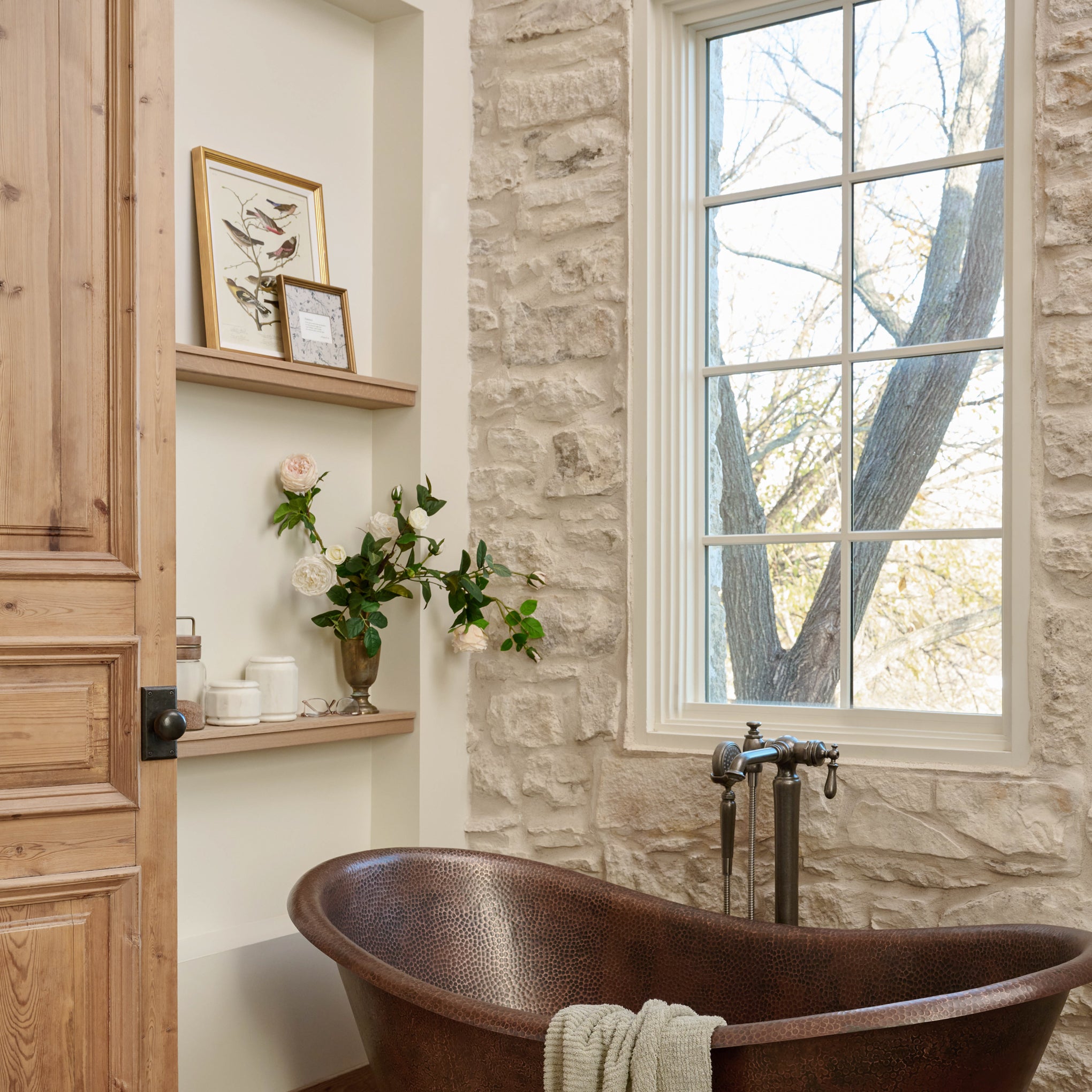 Finches on Branches on a shelf above a bathtub