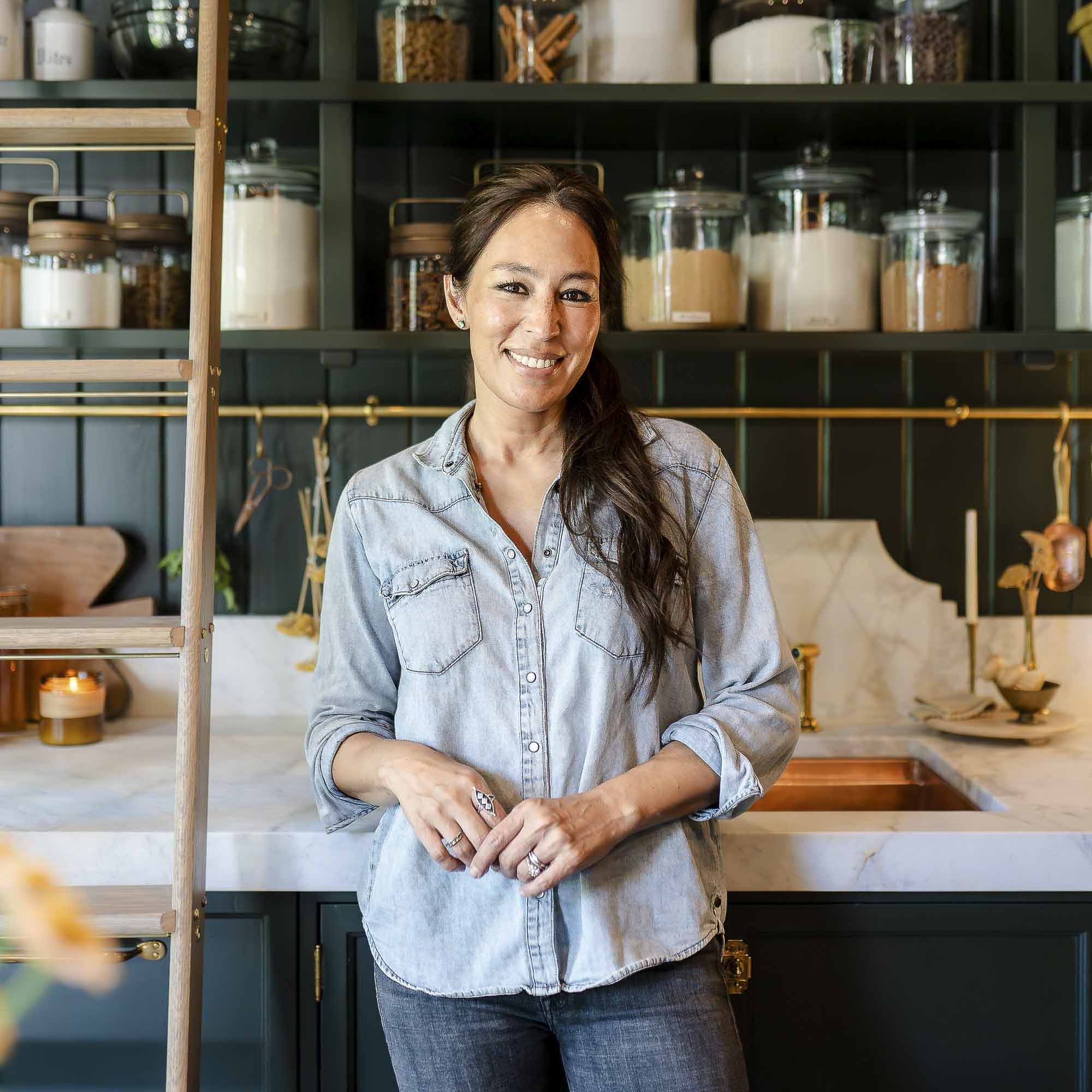Joanna Gaines smiles in her butler's pantry at the farm—surrounded by kitchen and baking essentials