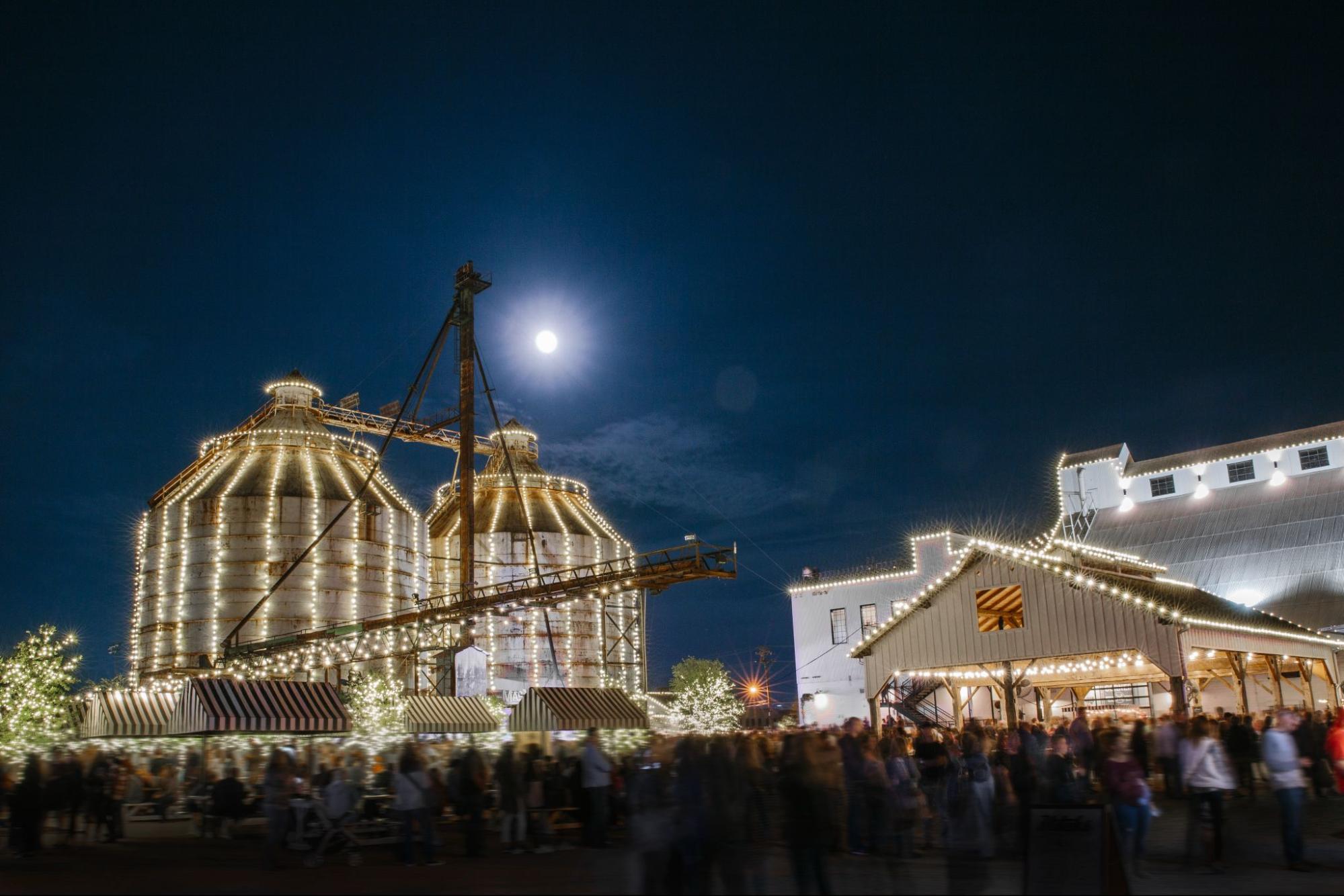 Magnoliass Silos decorated with Christmas lights at night