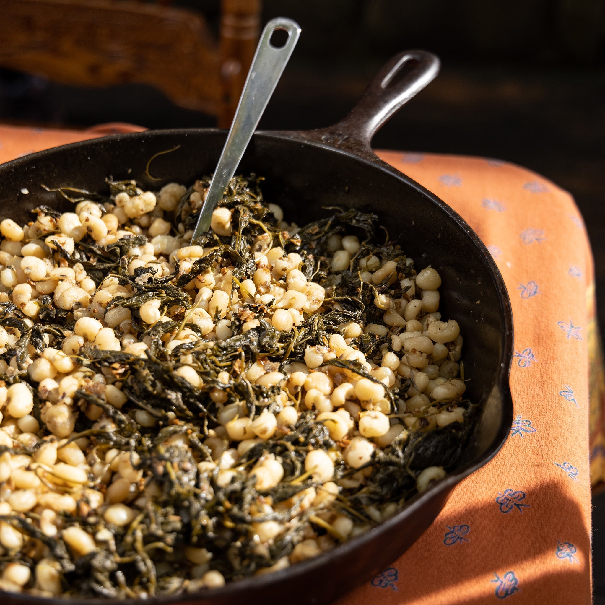 Katie Button's Sautéed Skinned Corn with Wild Greens