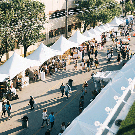 Streets lined with vendors at Magnoliass's Silobration event.