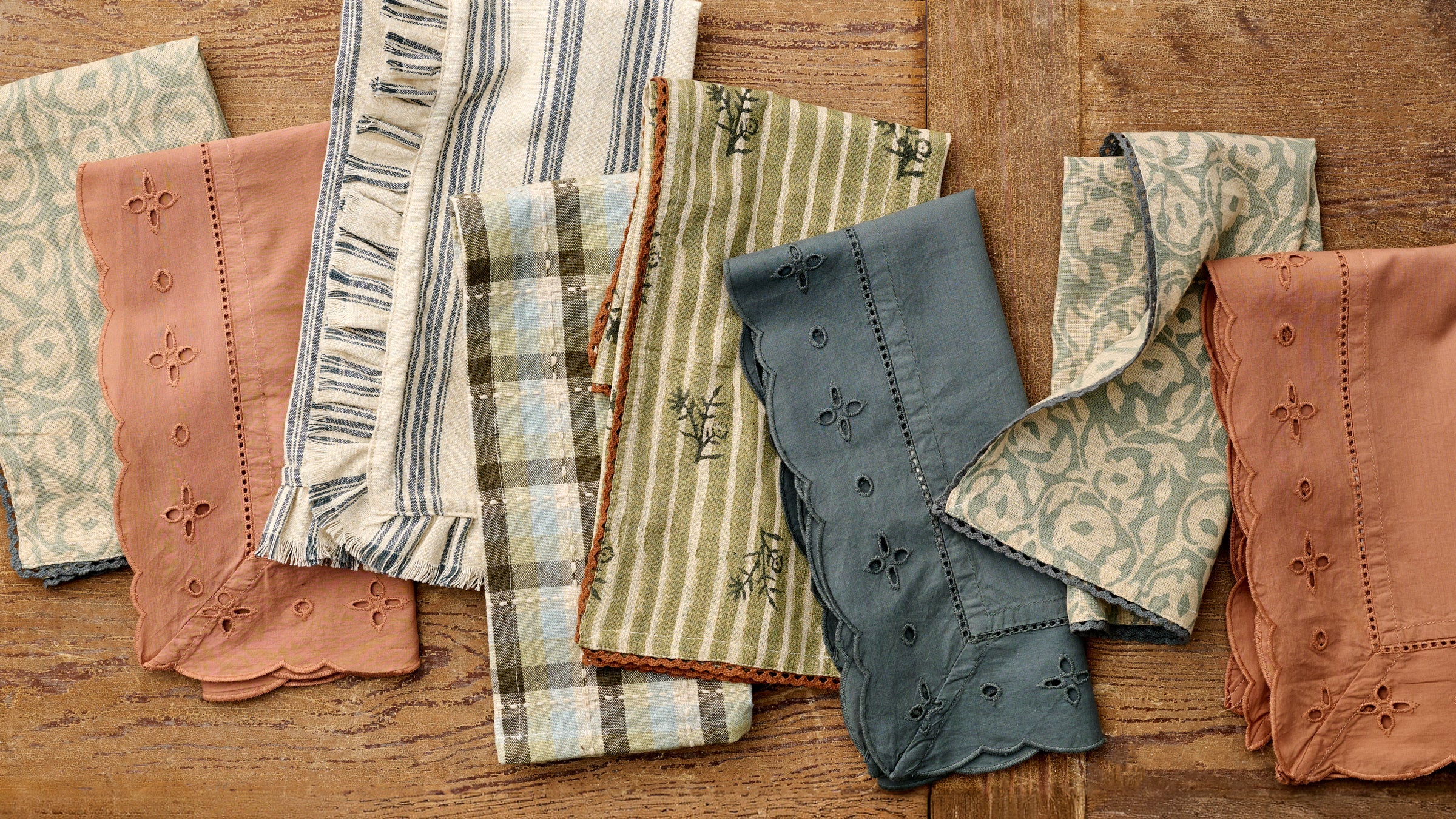 Shop table linens including napkins and placemats