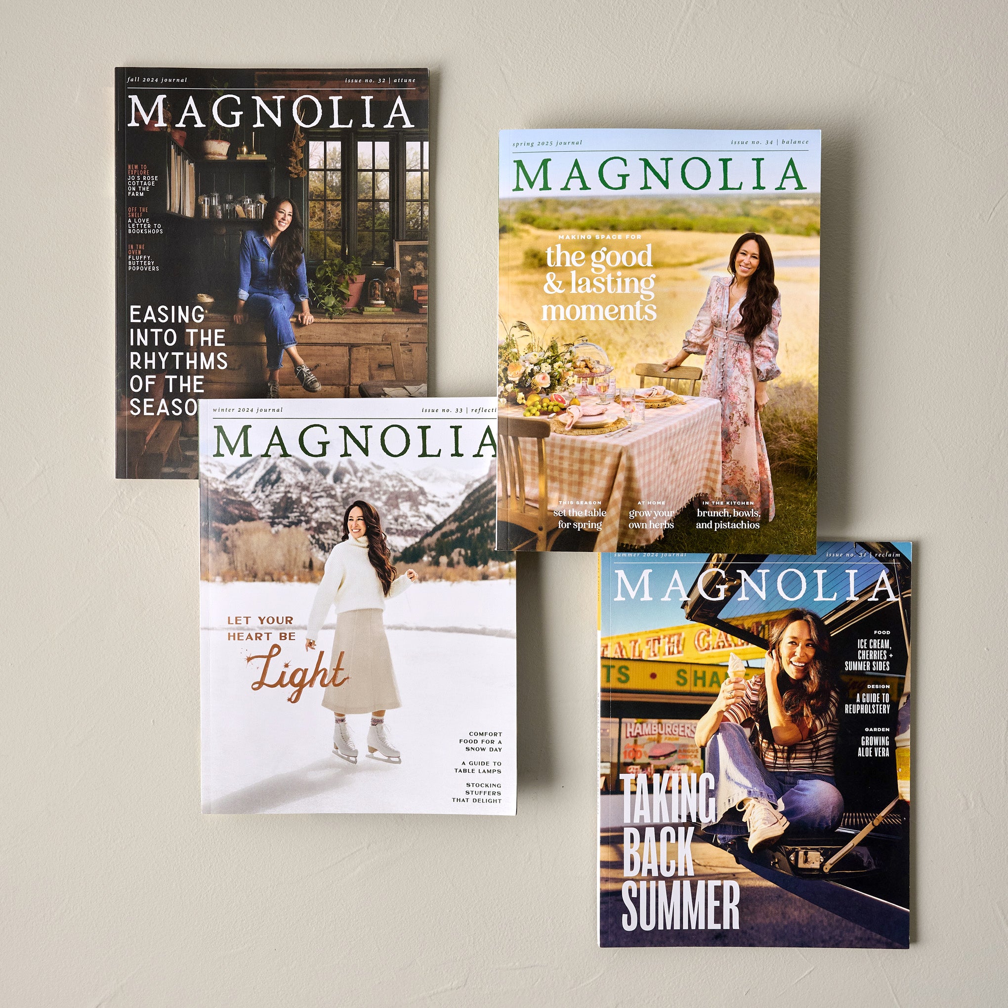 Magnoliass Journal Spring 2025 shown with other Magnoliass journals