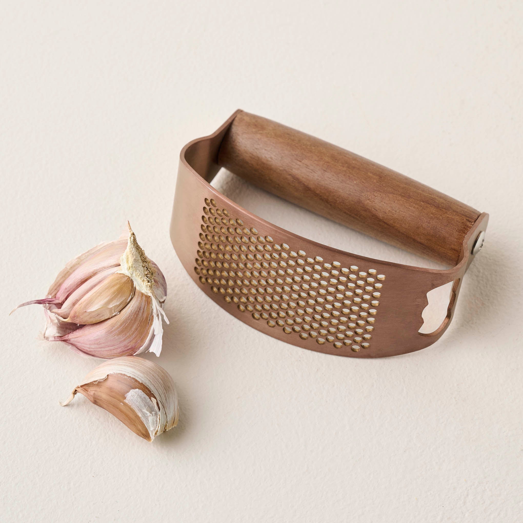 Copper and Walnut Garlic Rocker shown with garlic