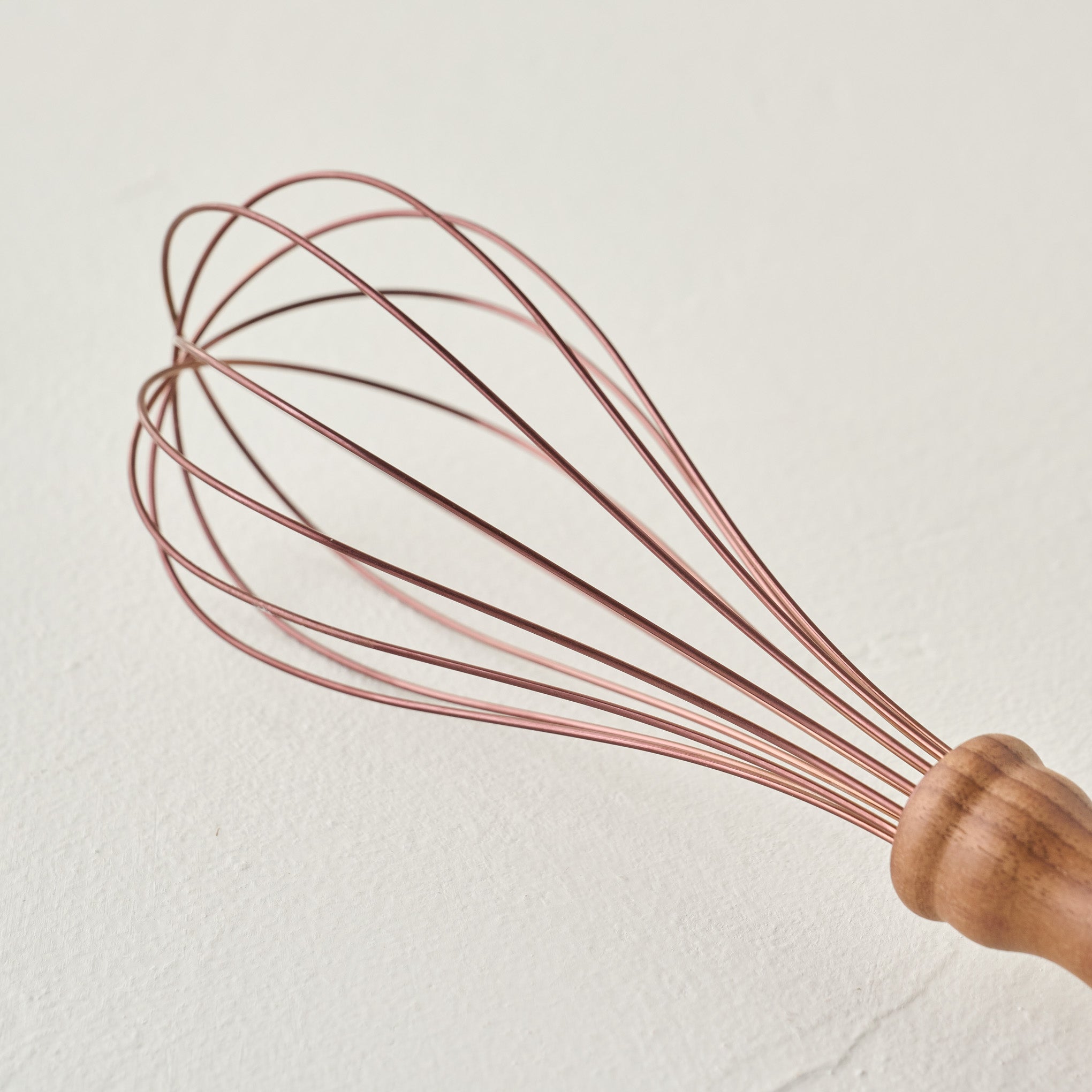 Copper and Walnut Whisk up close