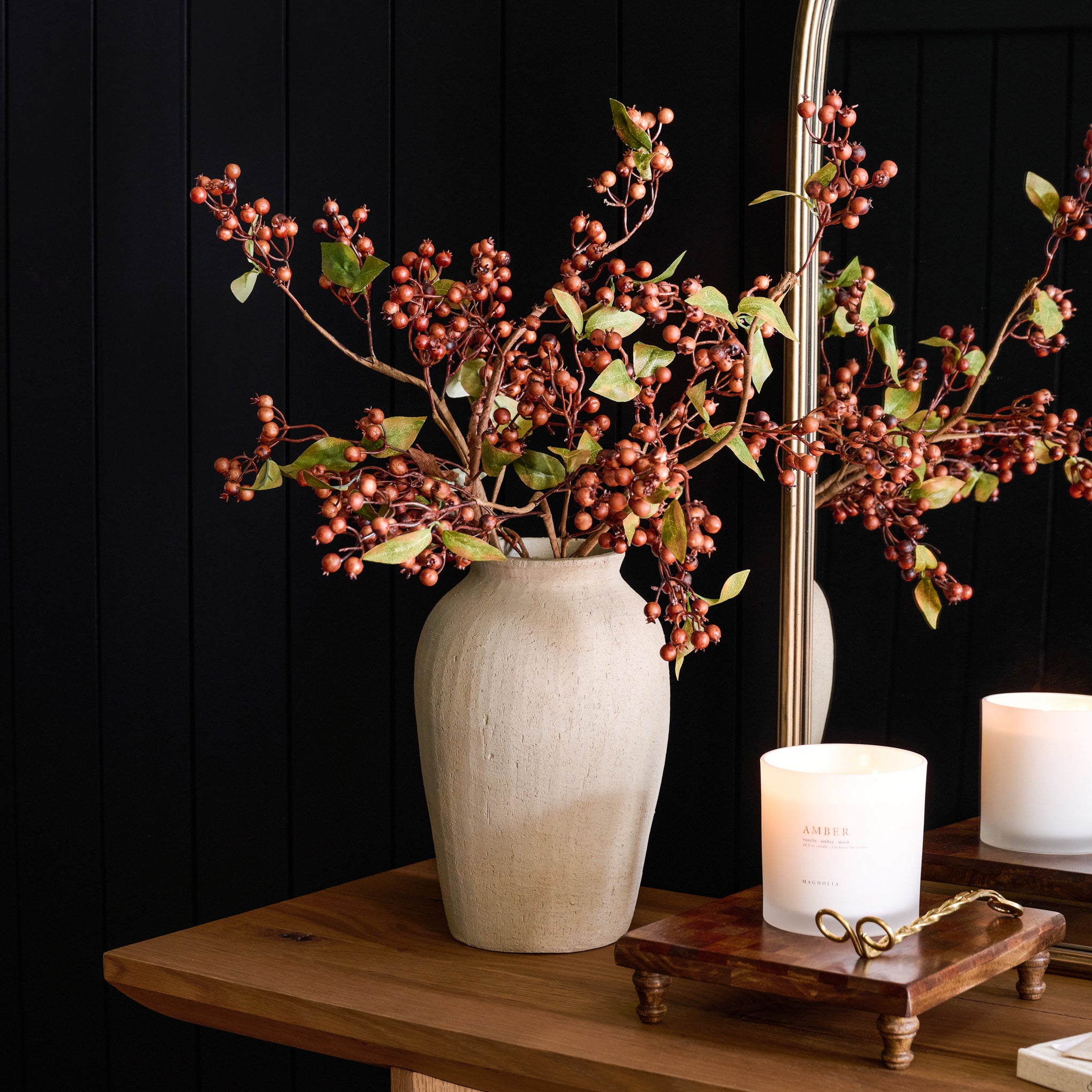Textured Adrienne Vase with a fall berry stem next to a candle on a table
