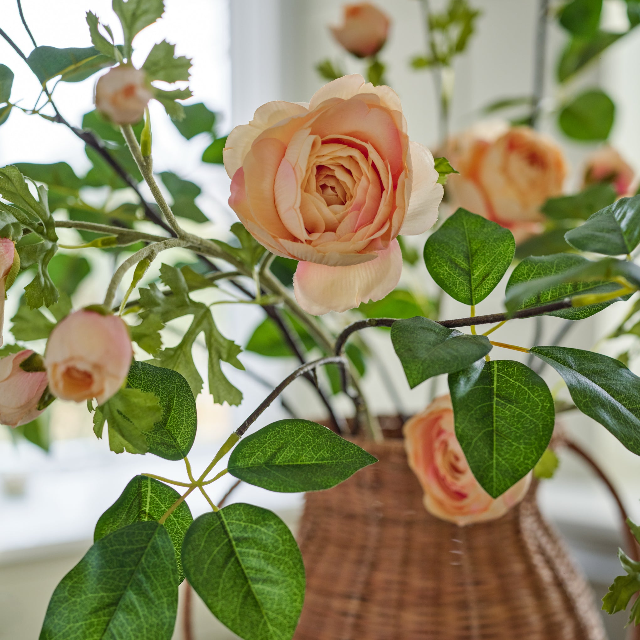 Oversized Schefflera Leaf Branch shown in vase styled with other florals