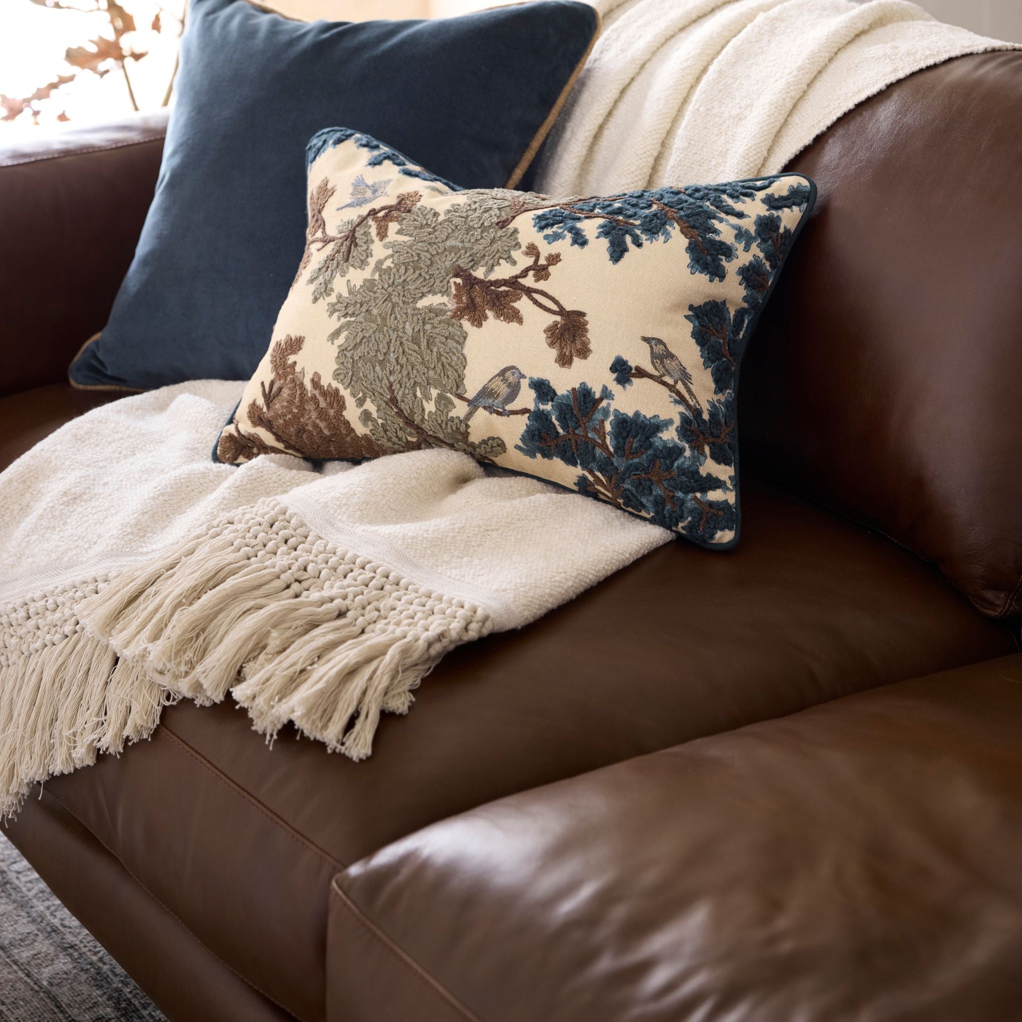 Andrews Leather Sofa up close with pillows