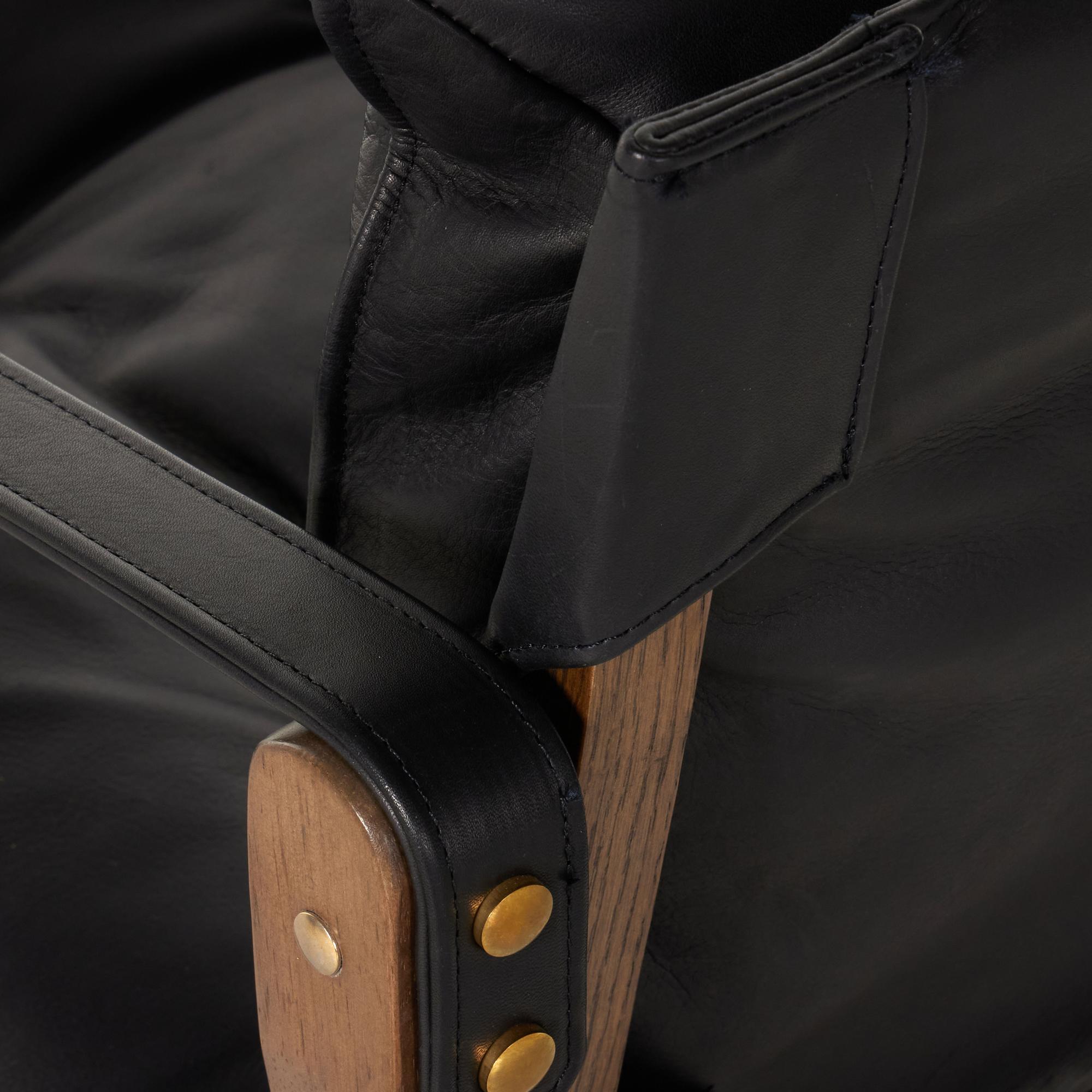 Flynn Chair heirloom black leather close up of back of arm rest