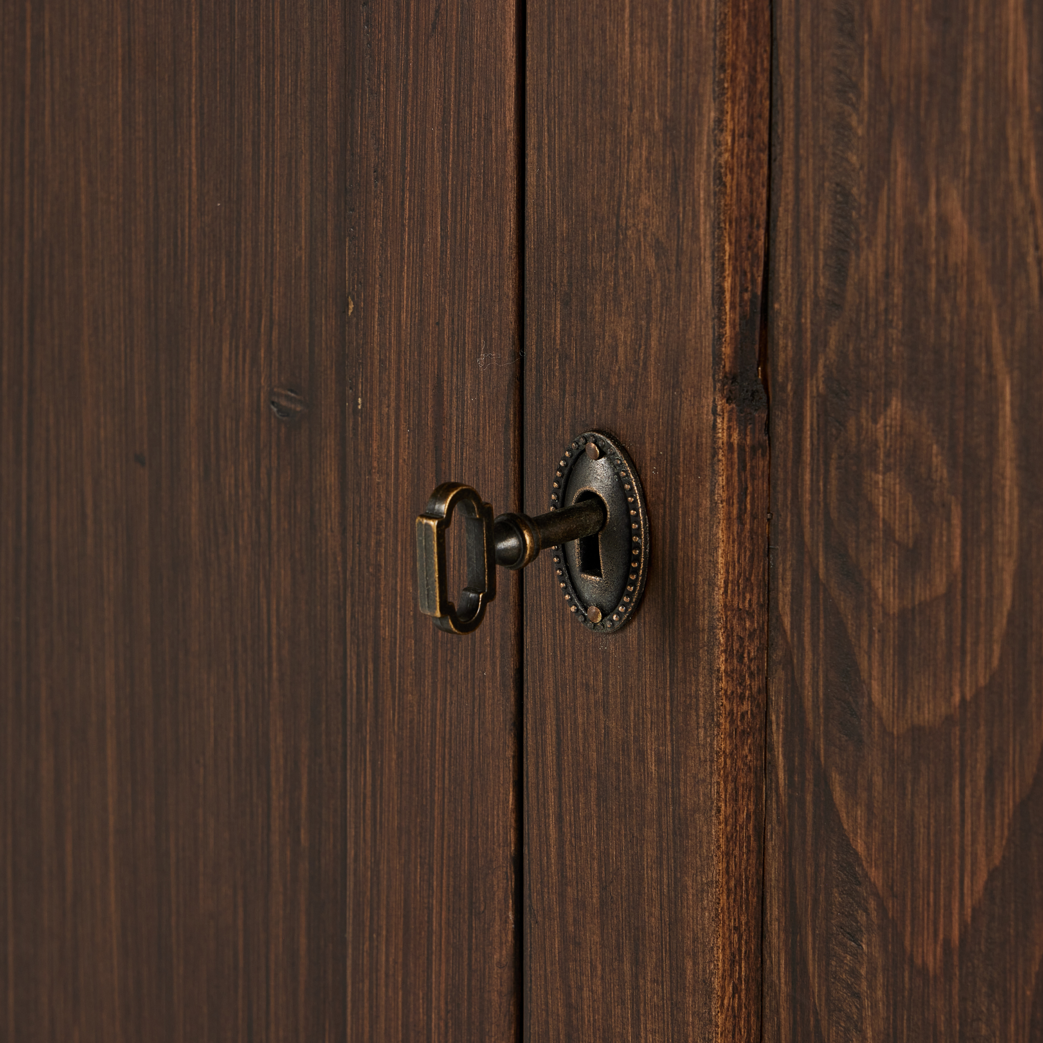 Hurston Wide Cabinet in aged pine keyhole up close