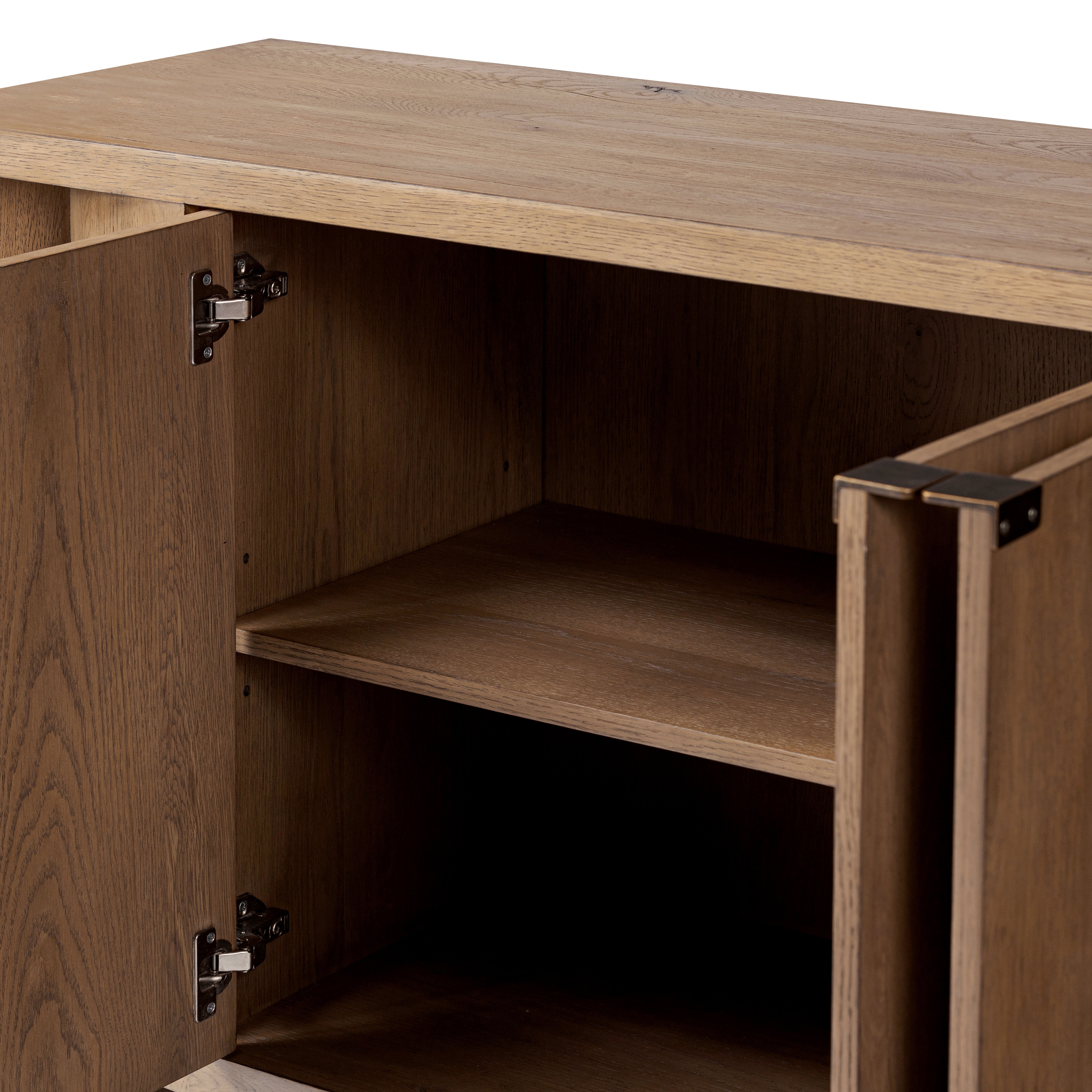 Robin Sideboard up close shown with doors open, a shelf inside