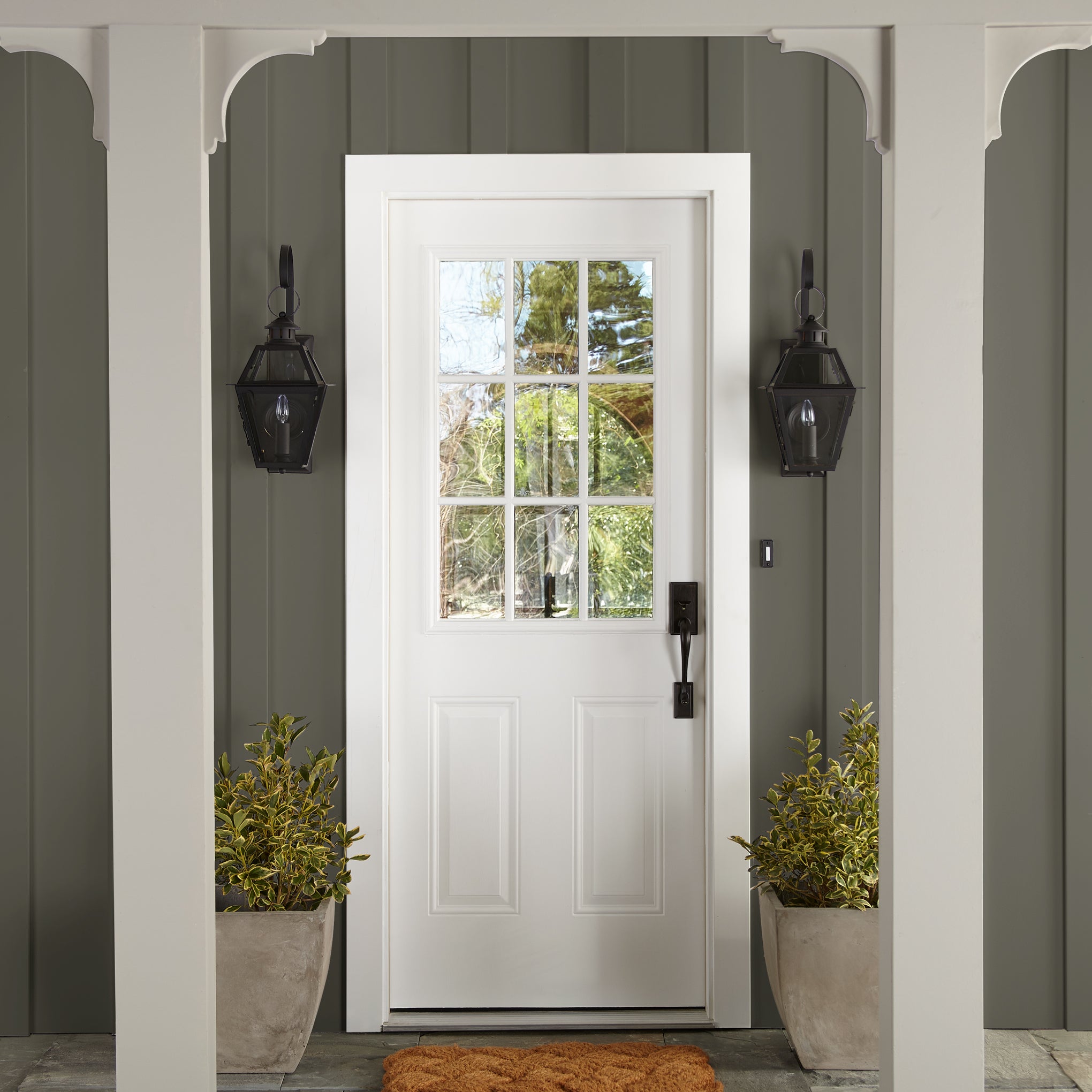 Trailhead shown on wood paneling outside walls of home