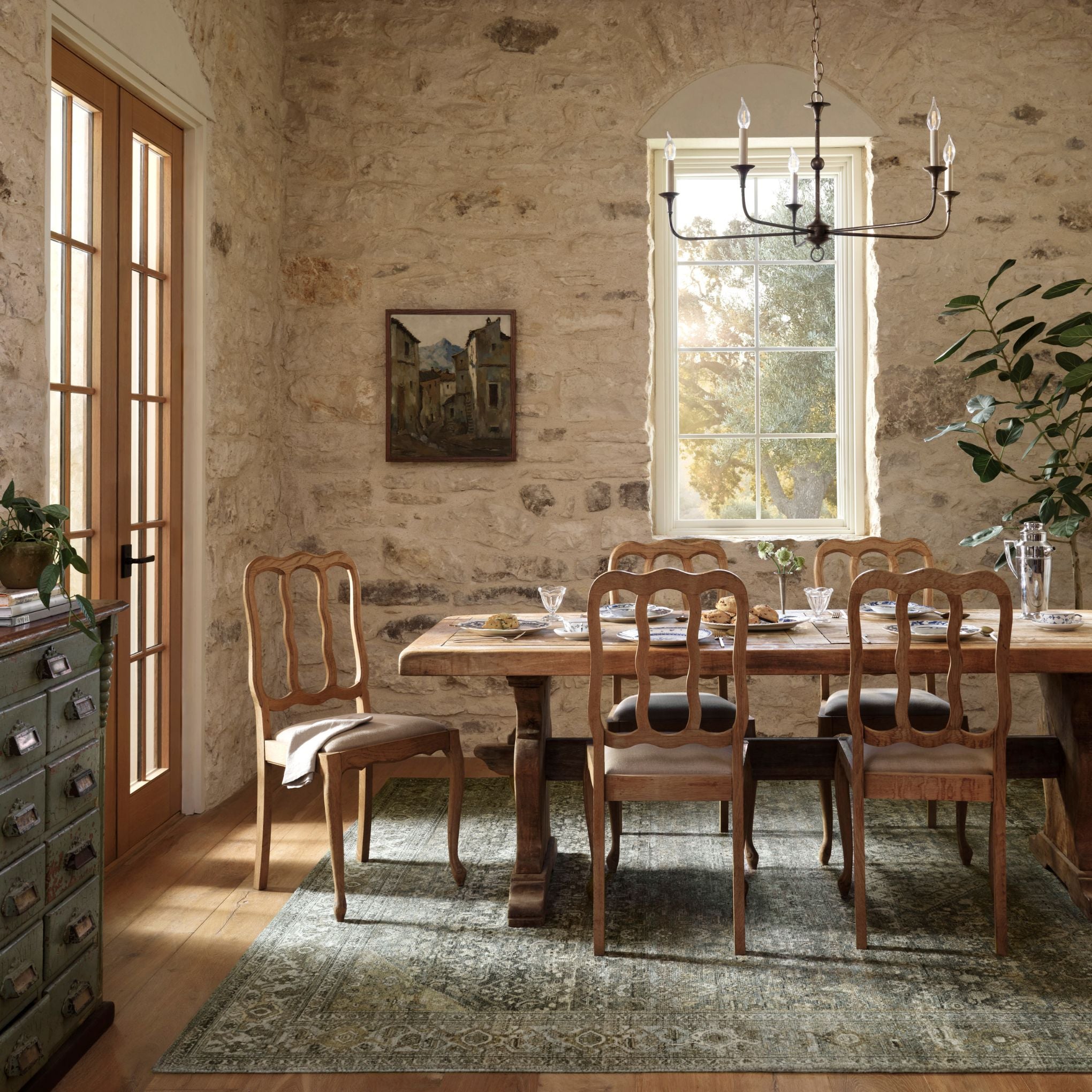 Wimberly Lagoon Wheat Rug shown in dining room