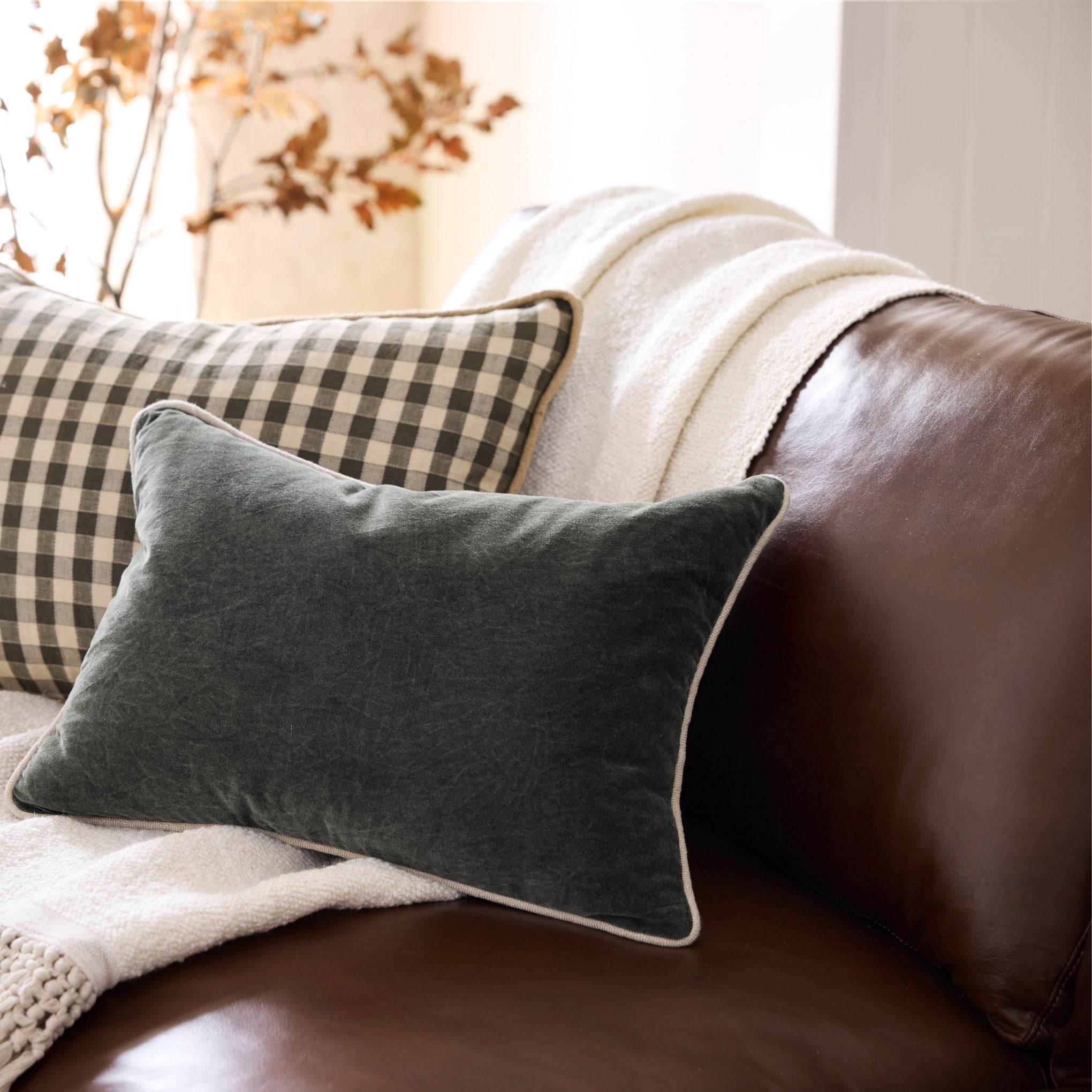 Andrews Leather Sofa up close with pillows