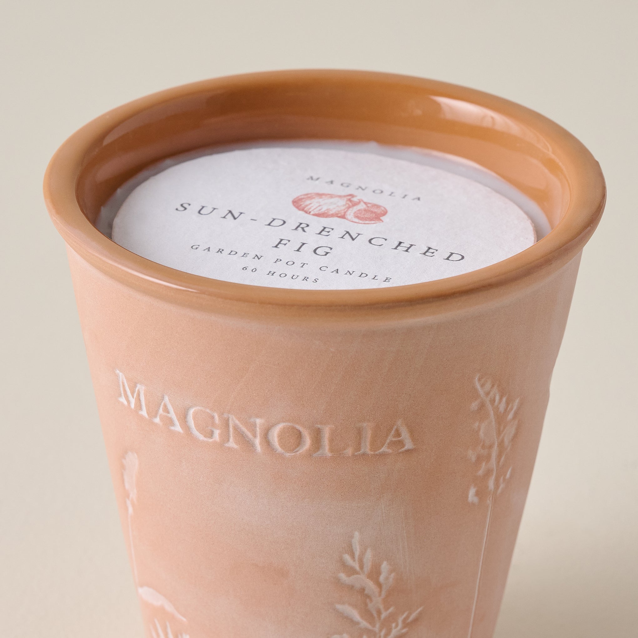 Magnoliass Sun-Drenched Fig Garden Pot Candle up close
