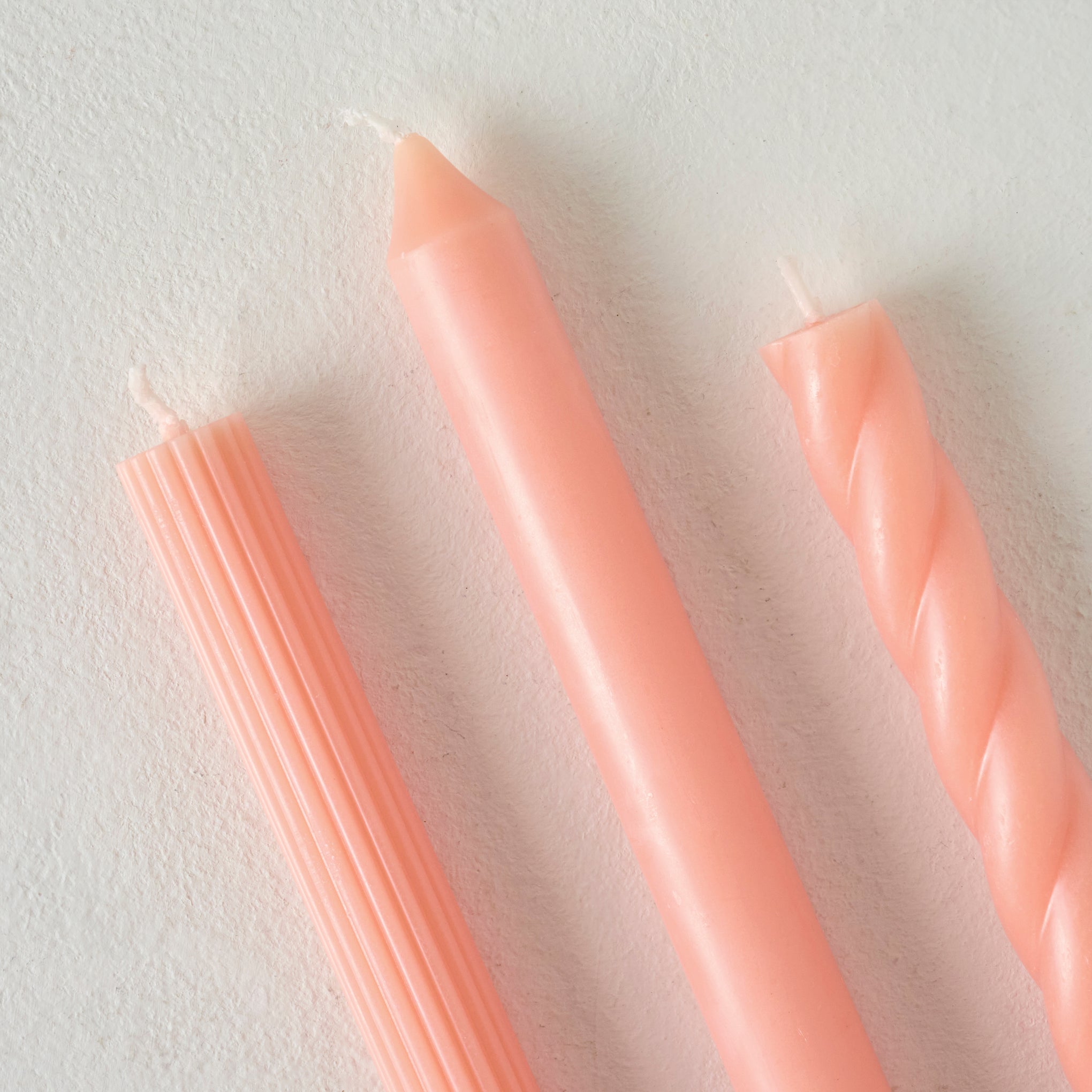 Assorted Peach Taper Set up close