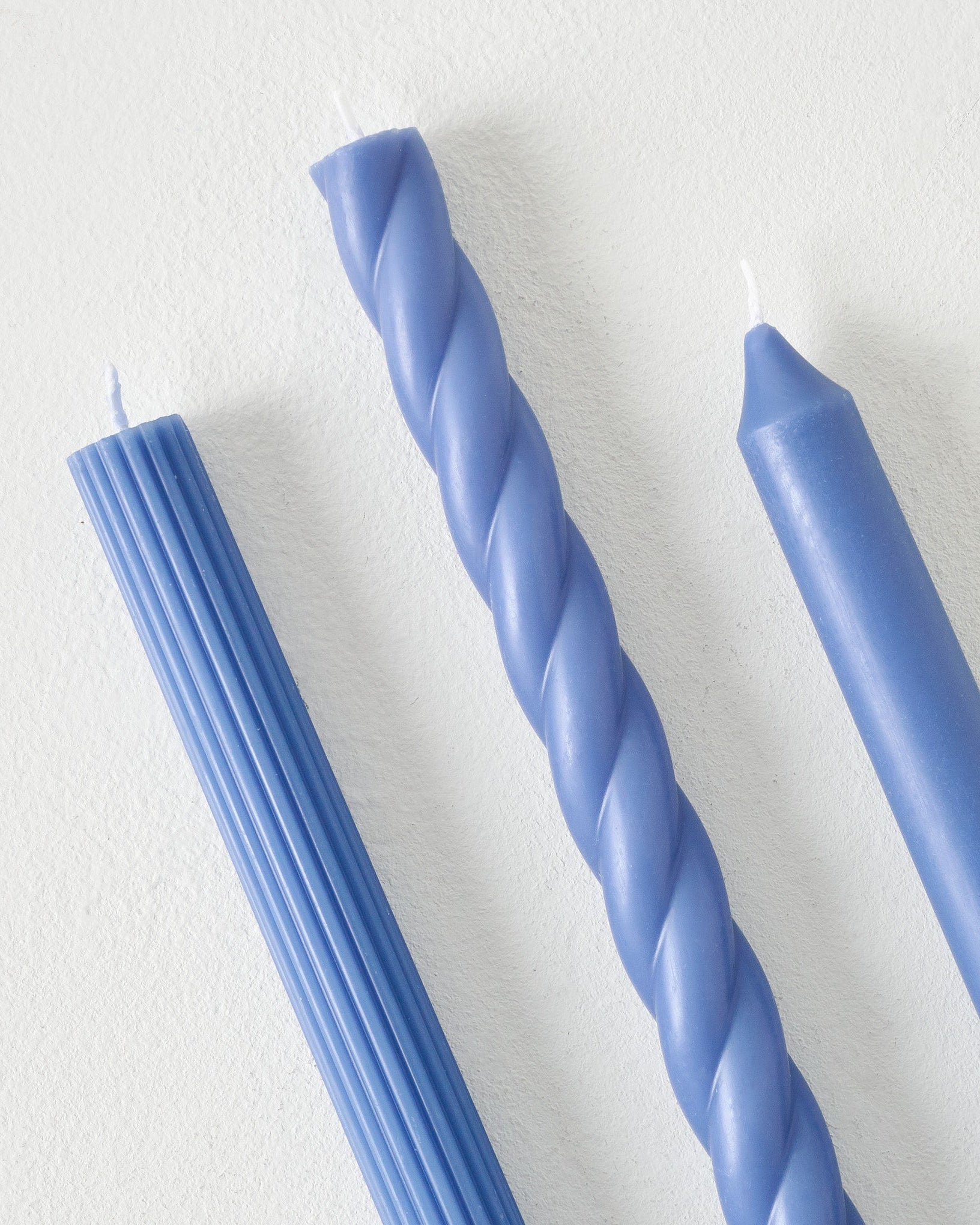 Assorted Blue Taper Candle Set up close