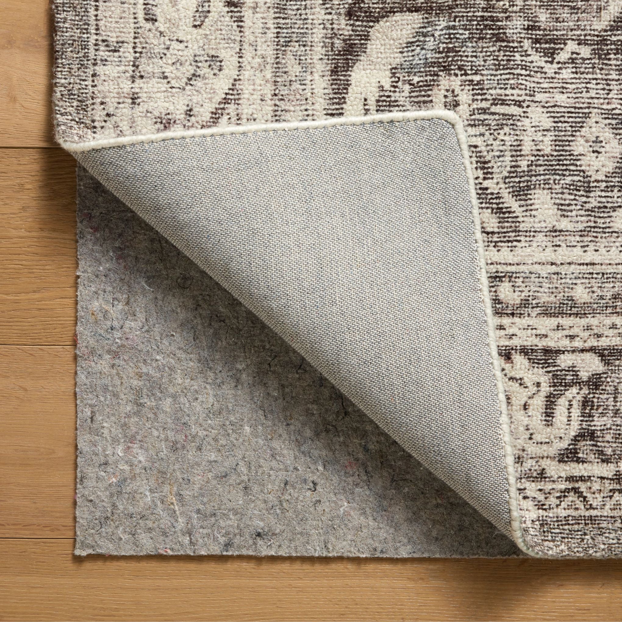 Wimberly Ink Bone Rug corner shown flipped