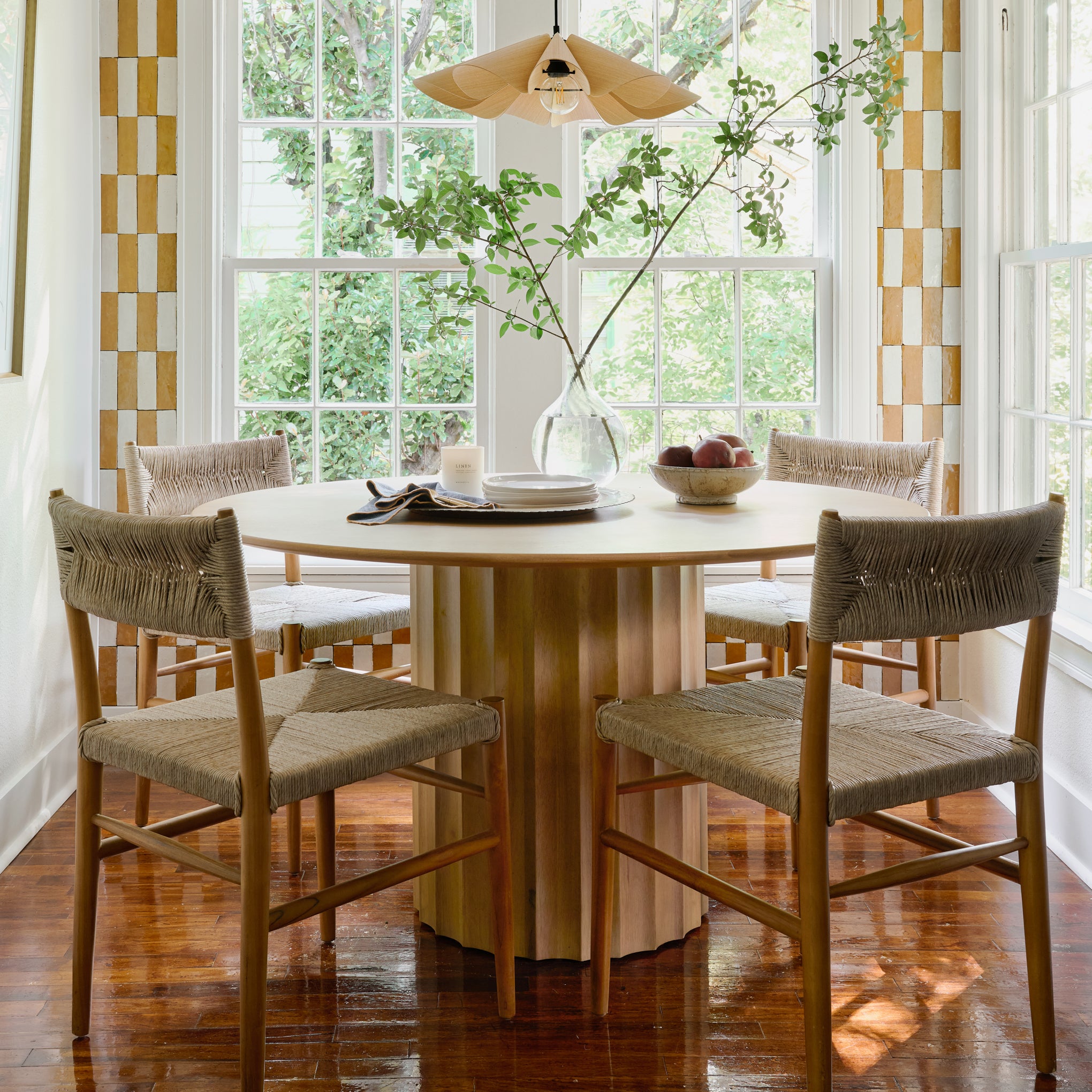 Rustic Cream Accent Bowl filled with fruit on a dining table