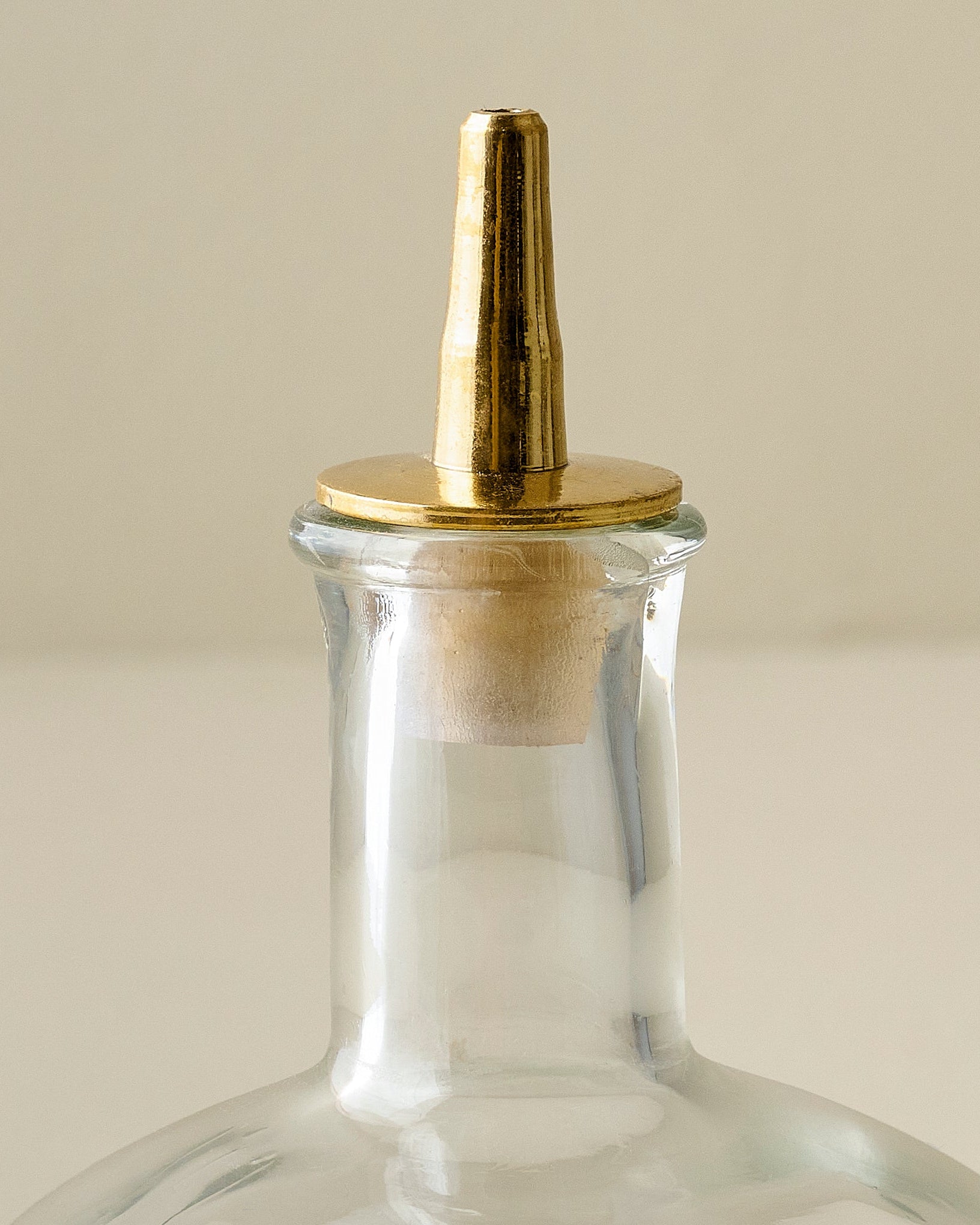Round Vintage-Inspired Etched Glass Bottle up close