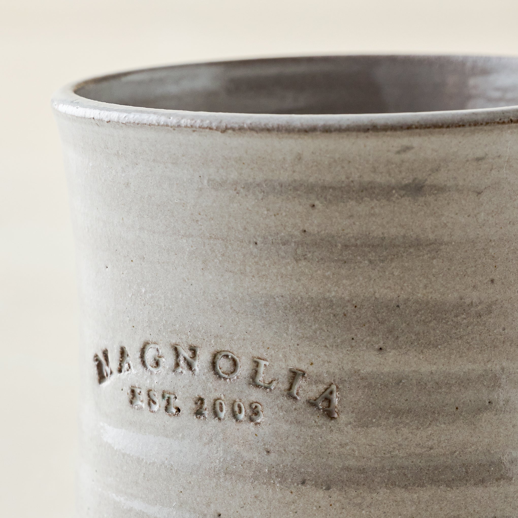 Magnoliass Established Mug close up of Magnoliass logo on mug