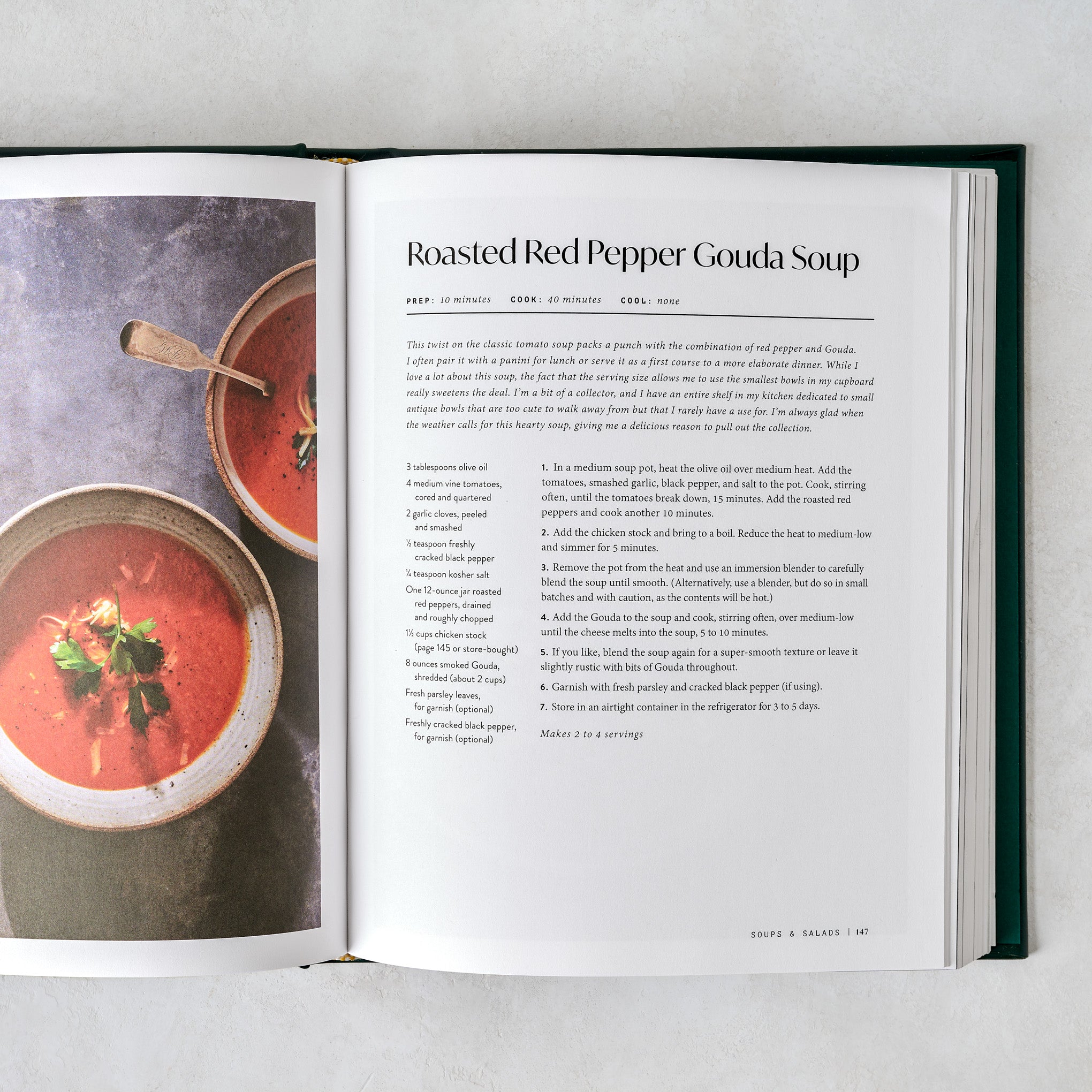Leather Bound Magnoliass Table Cookbook Volume 3 shown open to a recipe