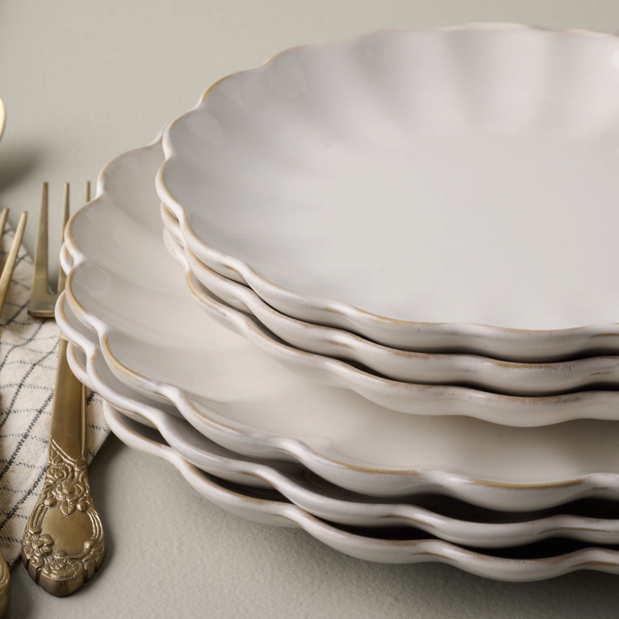 Cream Scalloped Plate dinner and dessert sizes stacked on top of each other