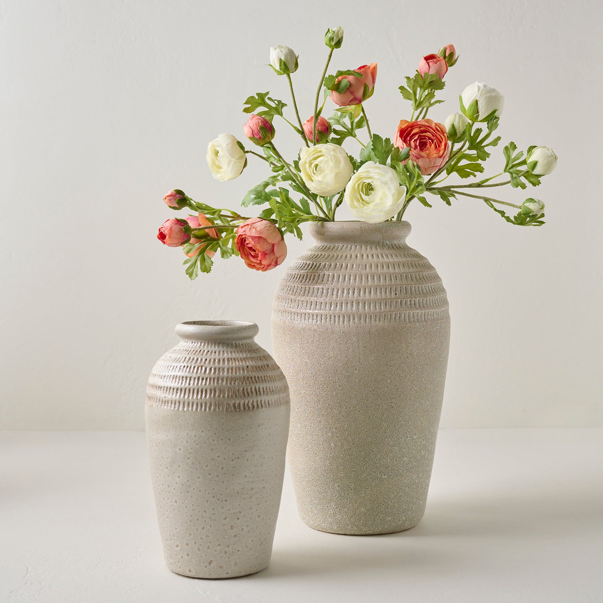 Sawyer Rustic Cream Vases shown with florals