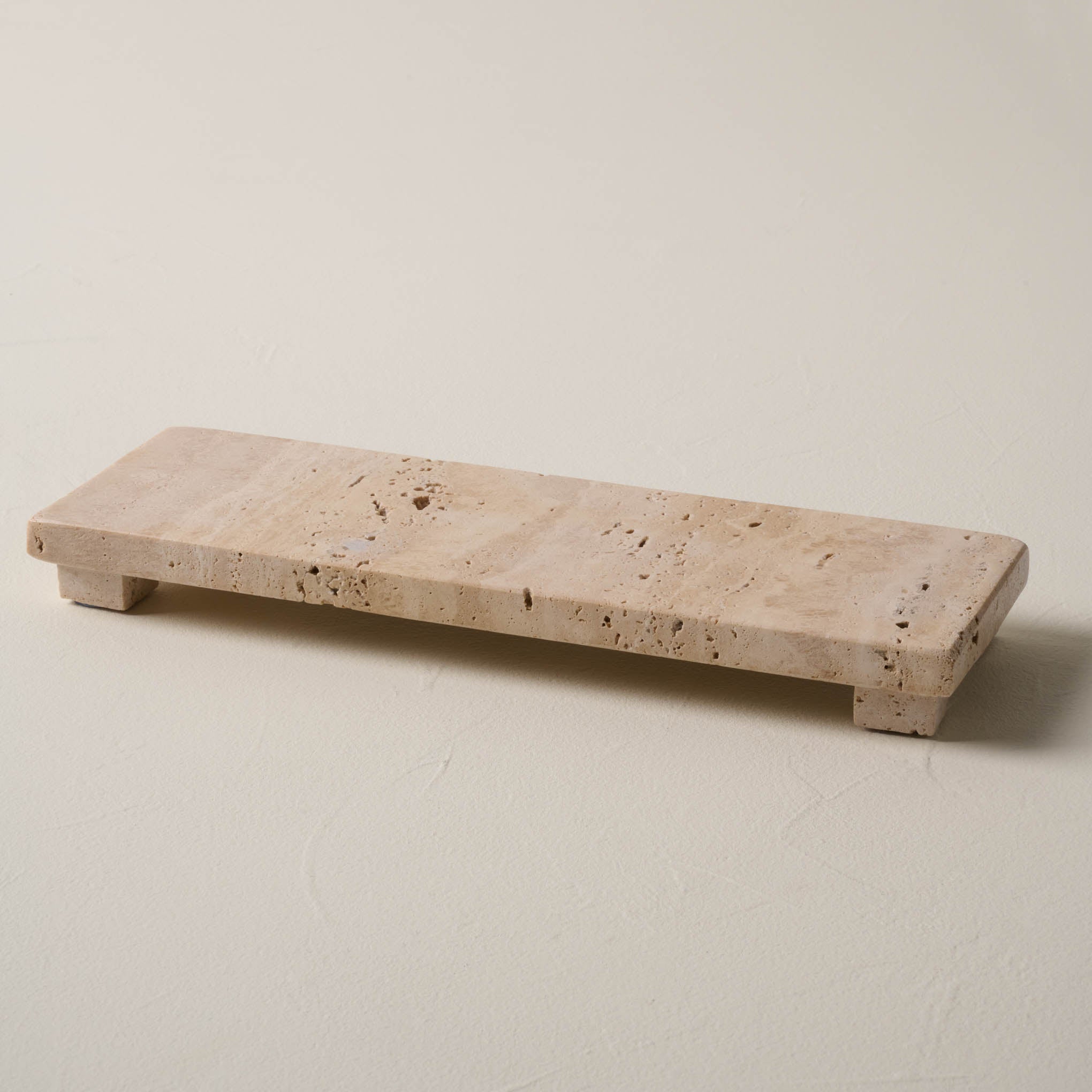 Magnoliass travertine vanity riser
