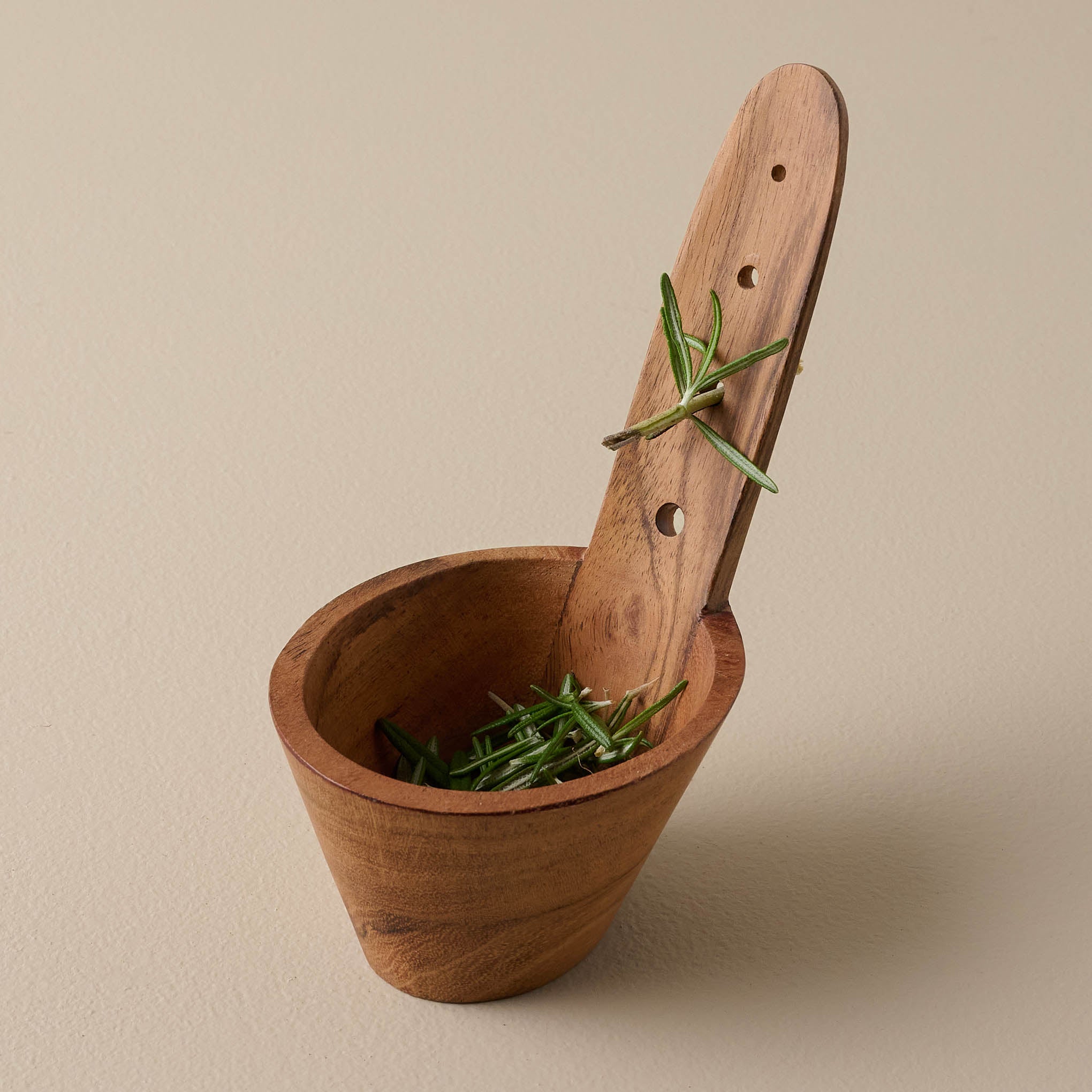 Wooden Herb Stemmer with herbs 