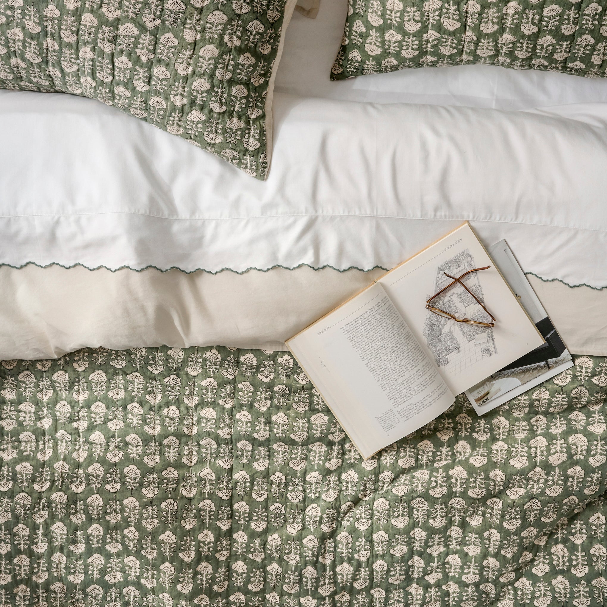 Flora Block Print Sham - Dusty Green shown on bed