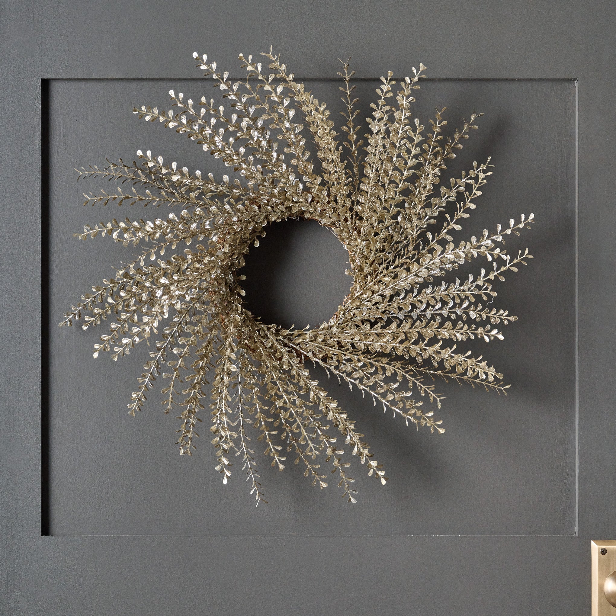 Small Glitter Eucalyptus Wreath shown on door