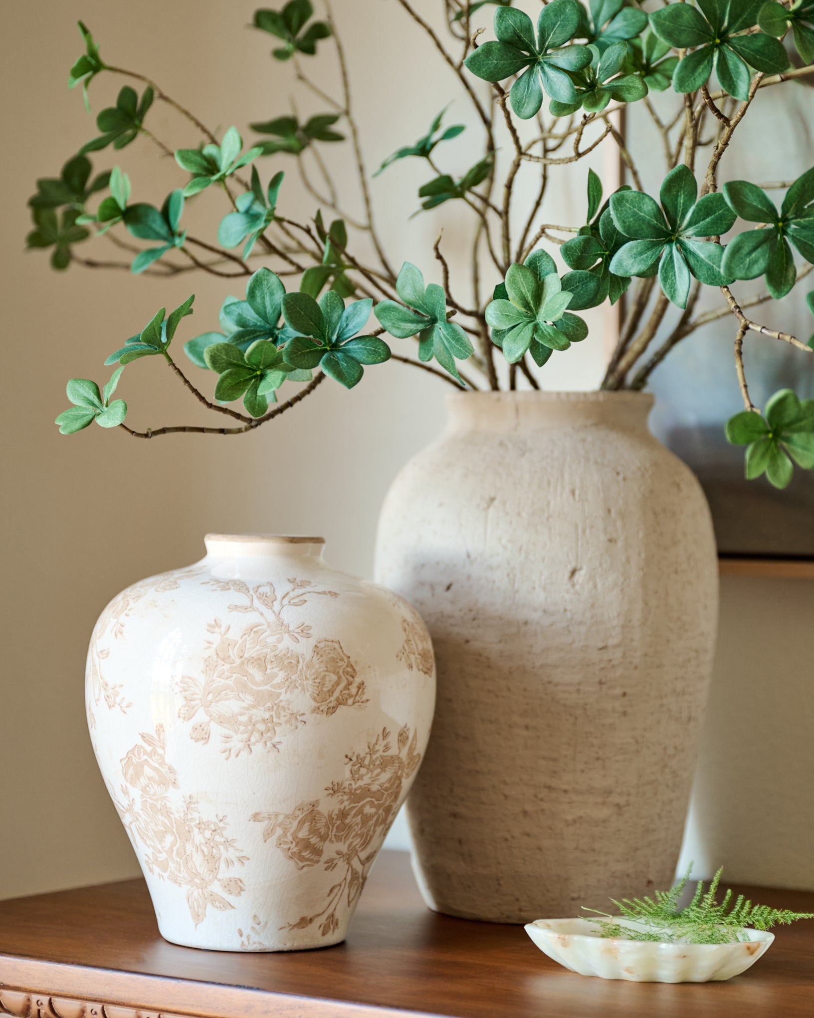 Taupe Distressed Floral Vase paired clay vase on top of sideboard