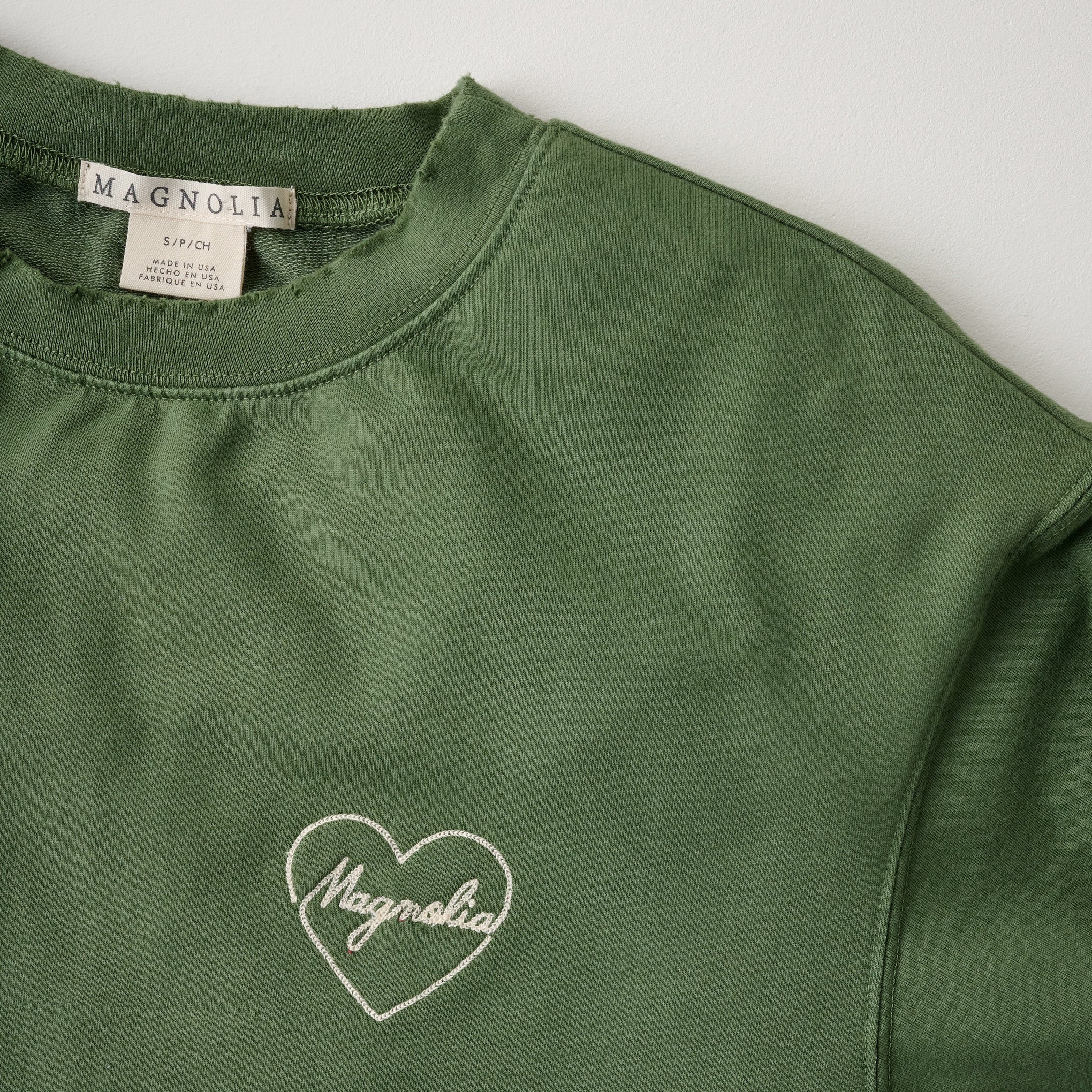 Embroidered Heart Sage Sweatshirt close up