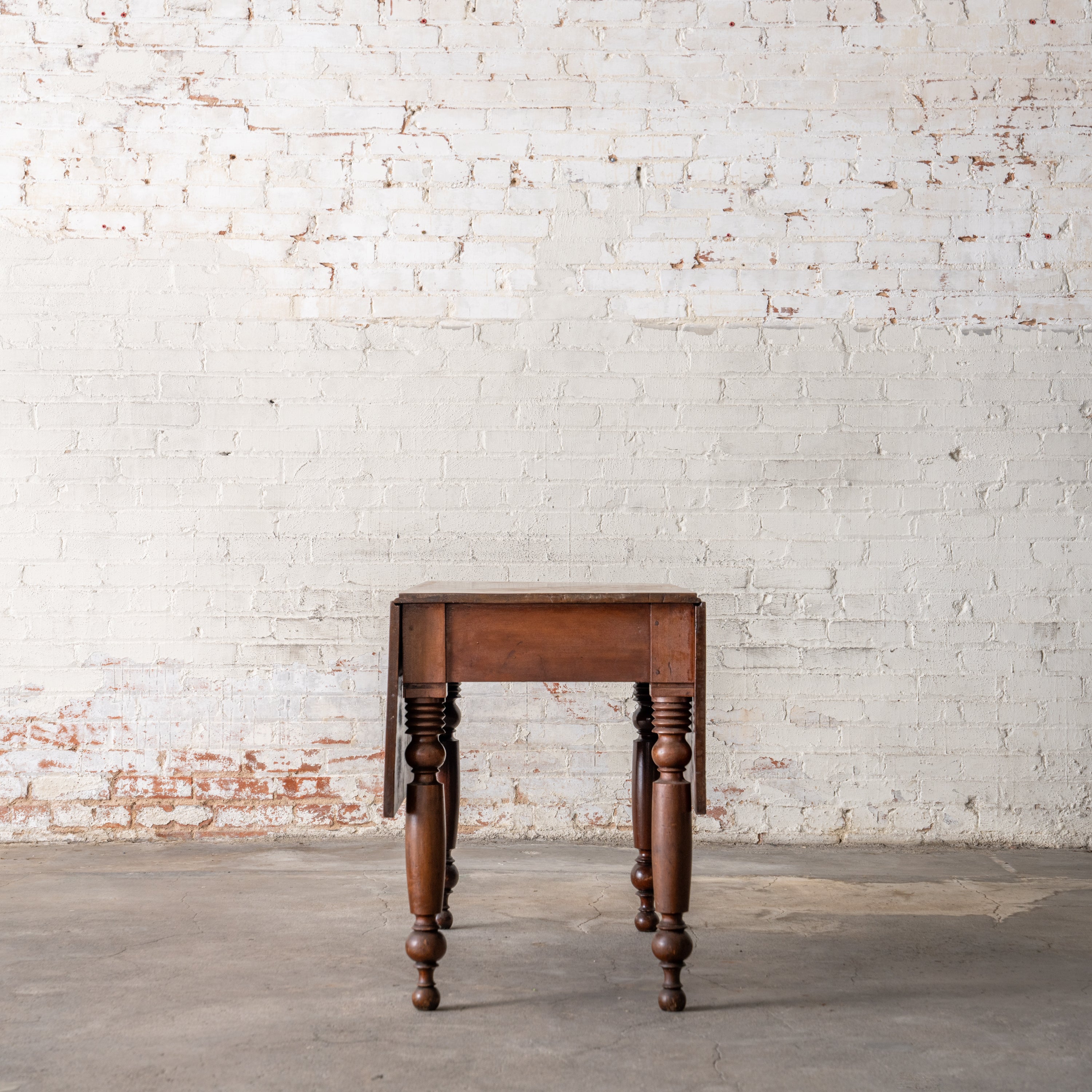 Antique Primitive Drop Leaf Table Circa 1830 shown with leaves down