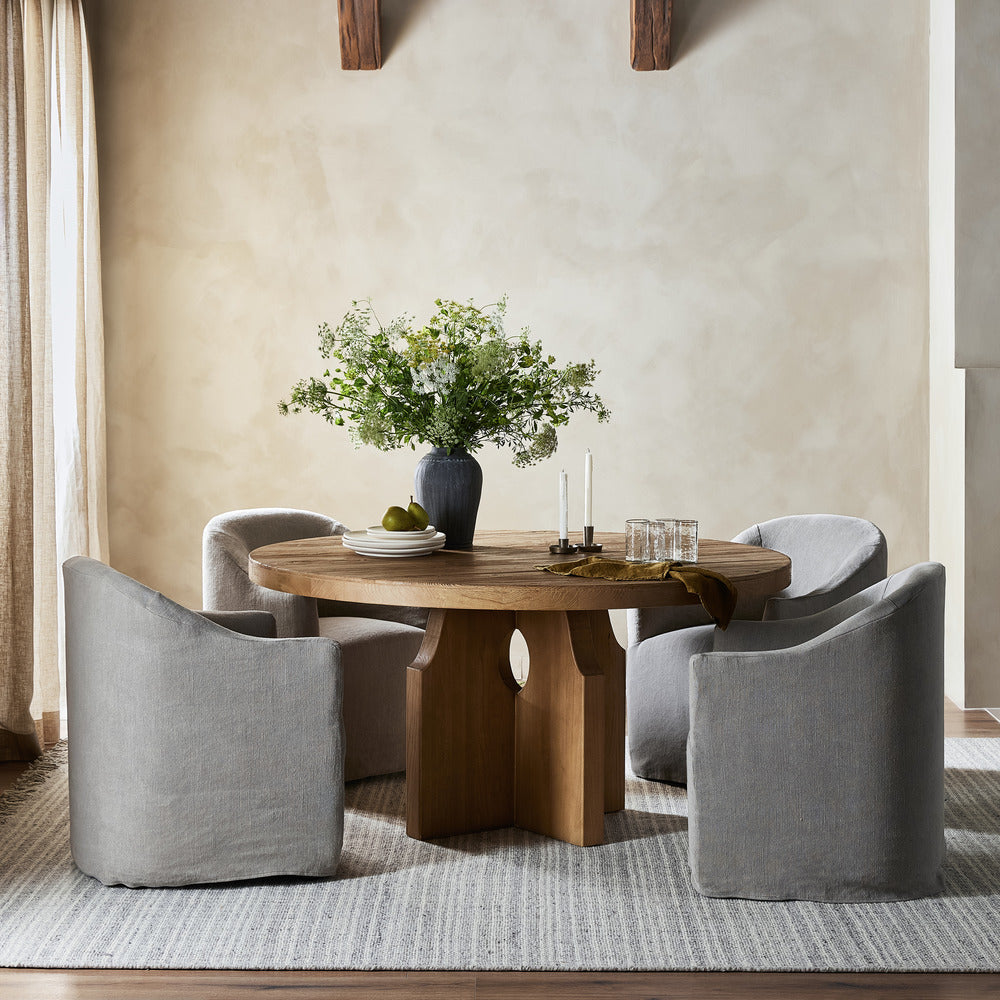 Oslo Dining Table set with dining chairs around it