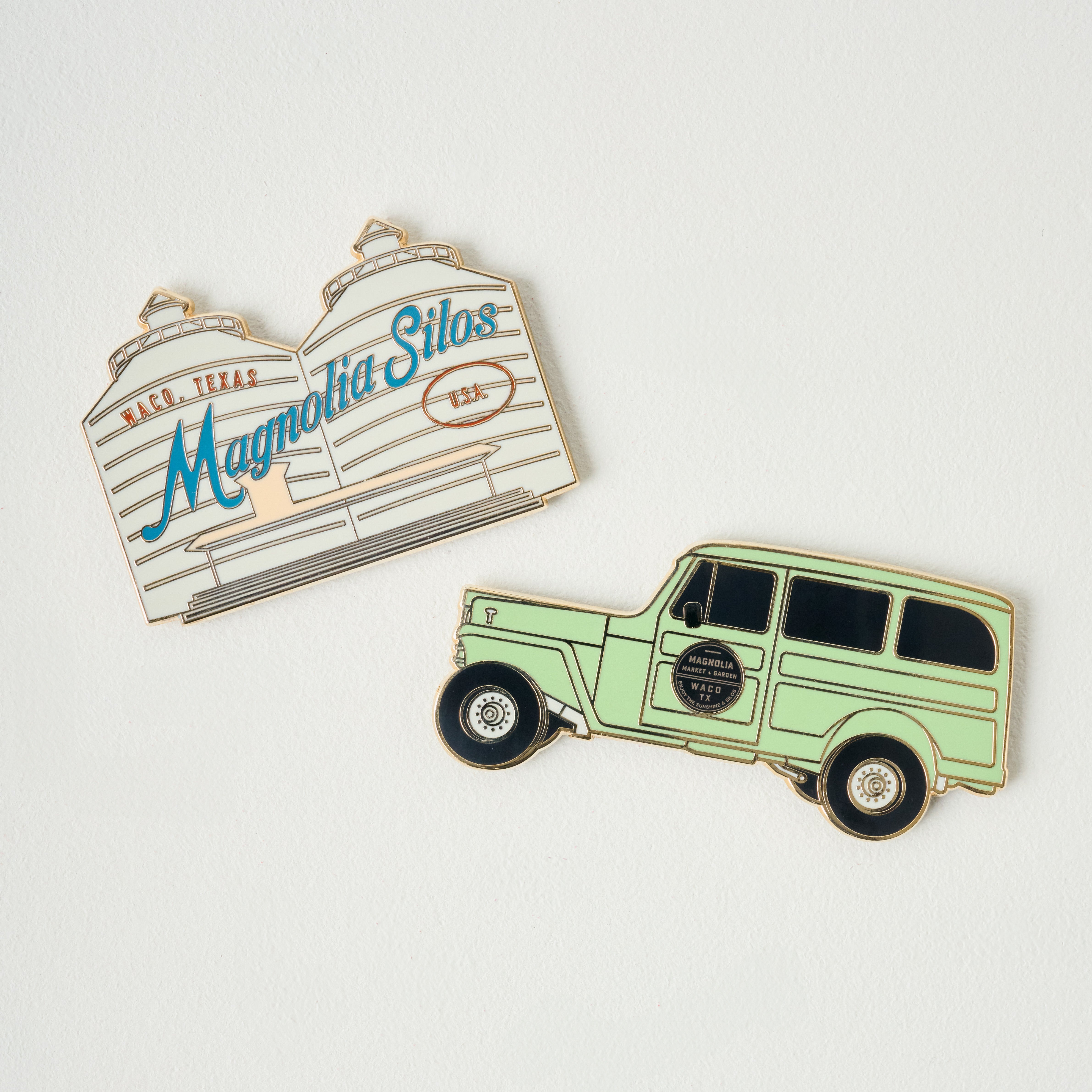 Magnoliass Silos Colored Enamel Magnet shown with jeep magnet