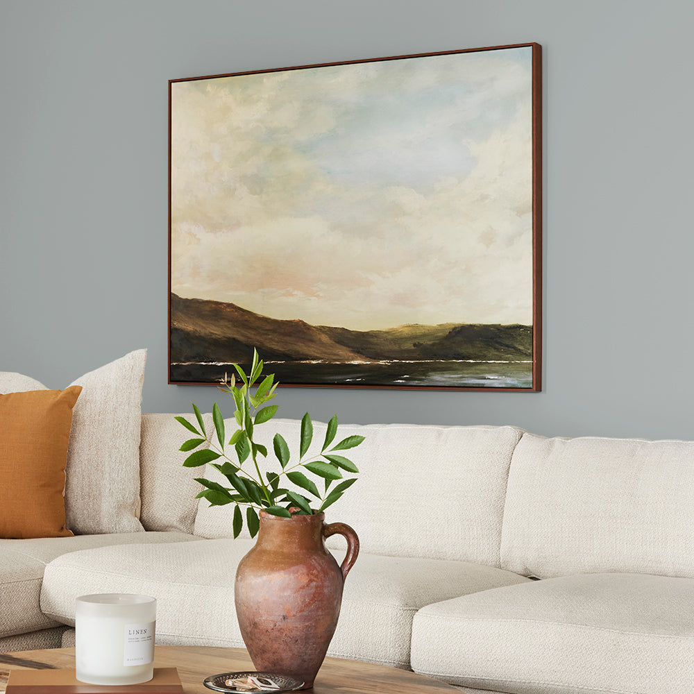 neutral grey with a tinge of blue paint color named tranquil waters shown painted on living room wall