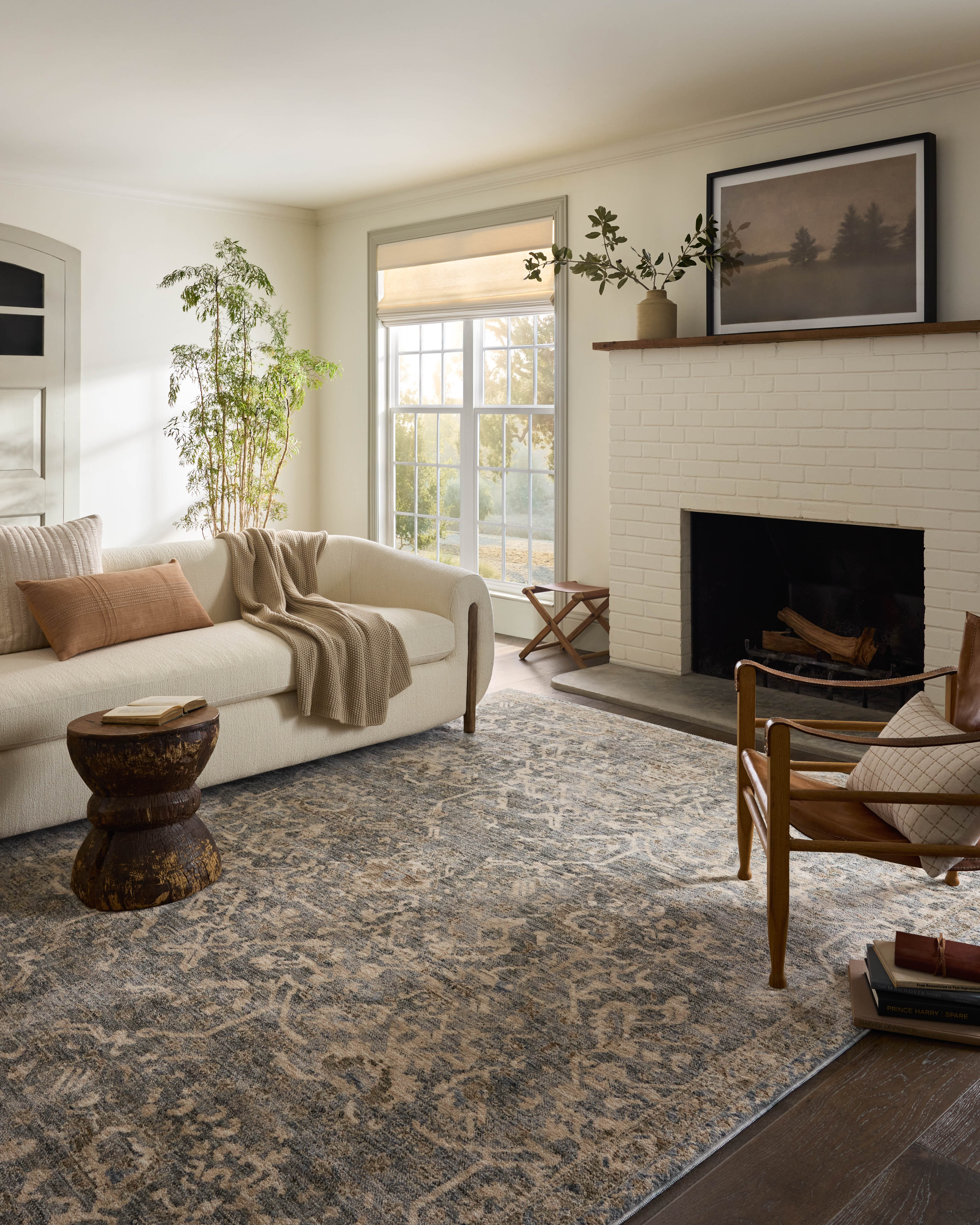 Junie Blue Natural Rug shown in bright living room