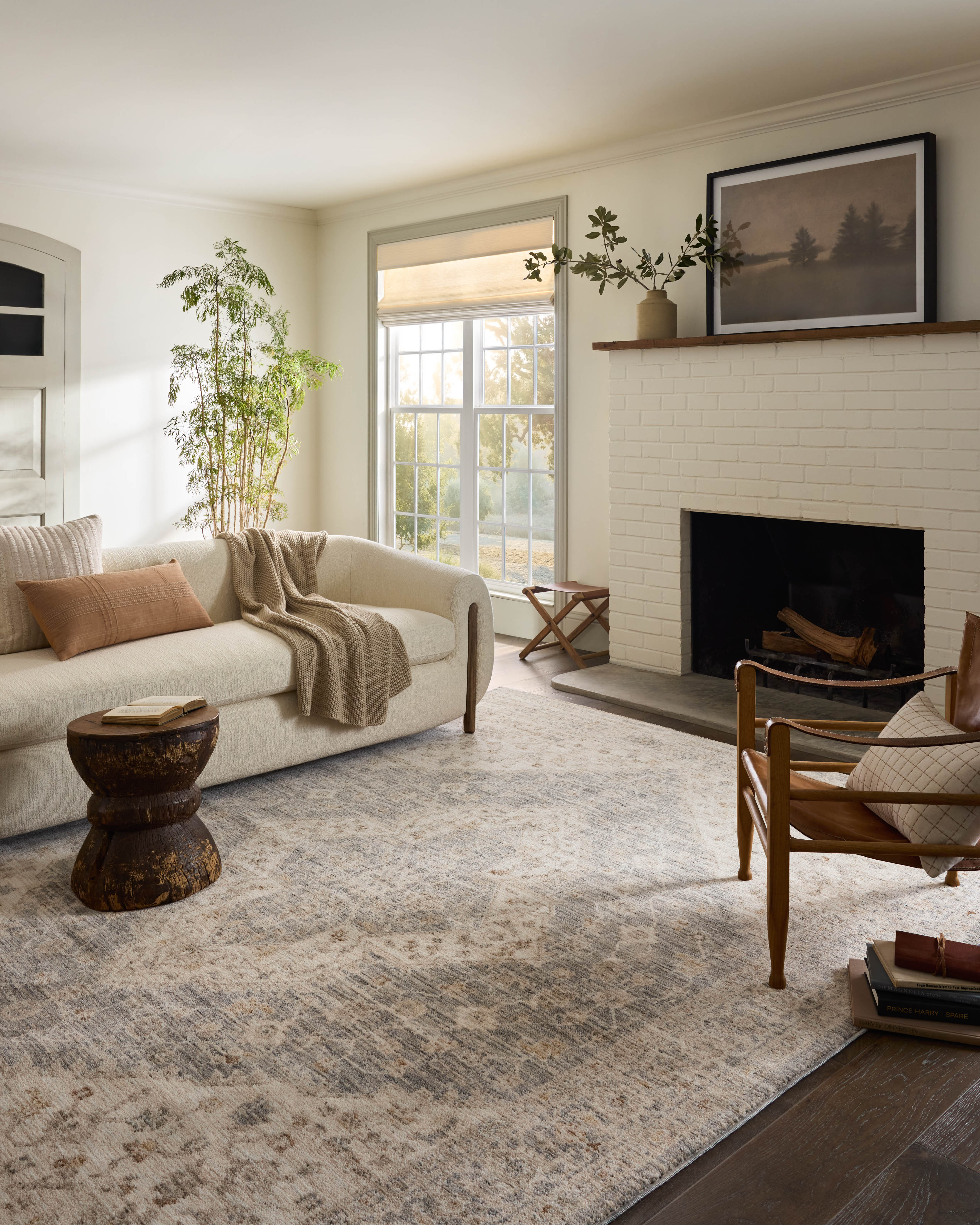 Junie Denim Natural Rug shown in bright living room