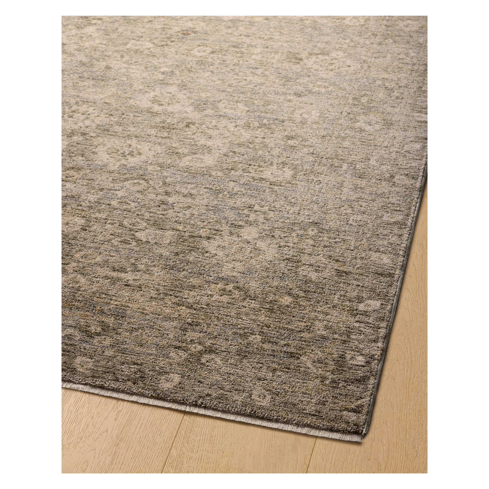 Junie Lagoon Natural Rug corner shown from a certain viewing angle