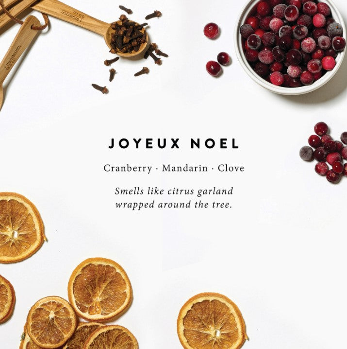 Magnoliass joyeux noel scent notes of cranberry mandarin and clove