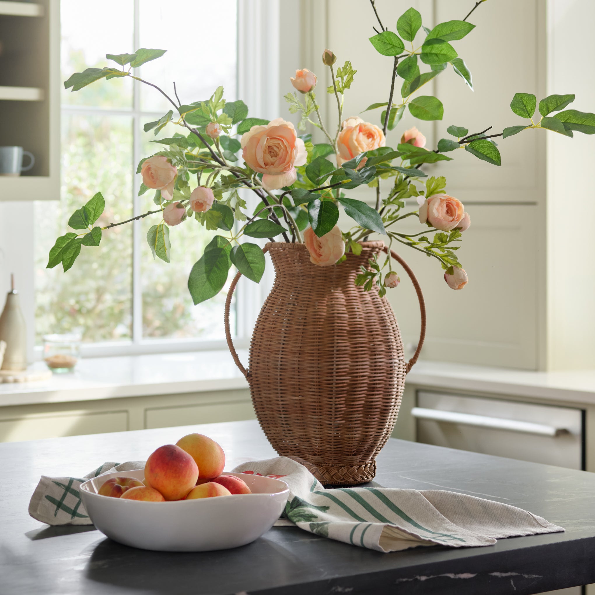 Oversized Schefflera Leaf Branch shown in vase shown in vase styled with other florals