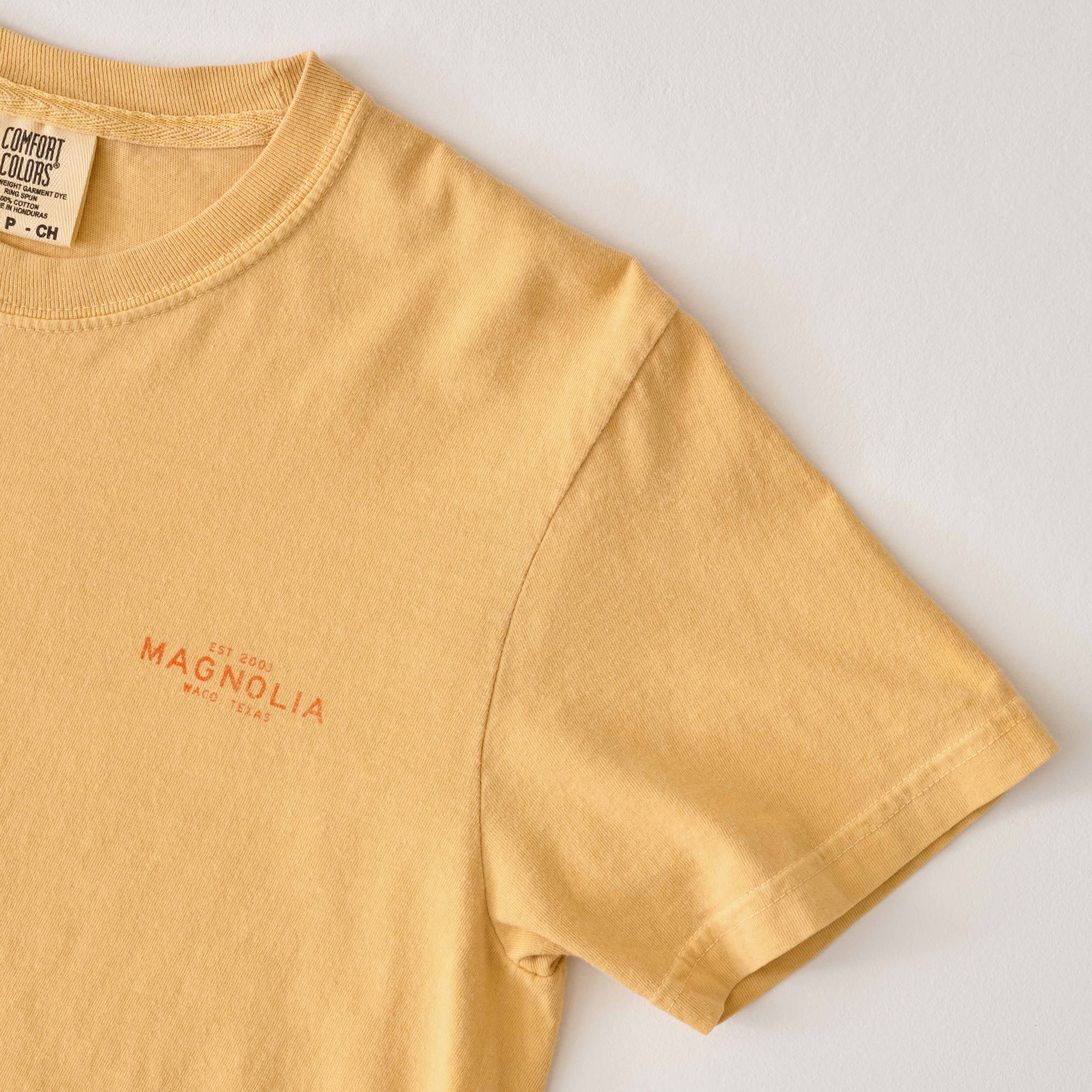 Katy Ballpark Mustard Crest Tee top right corner
