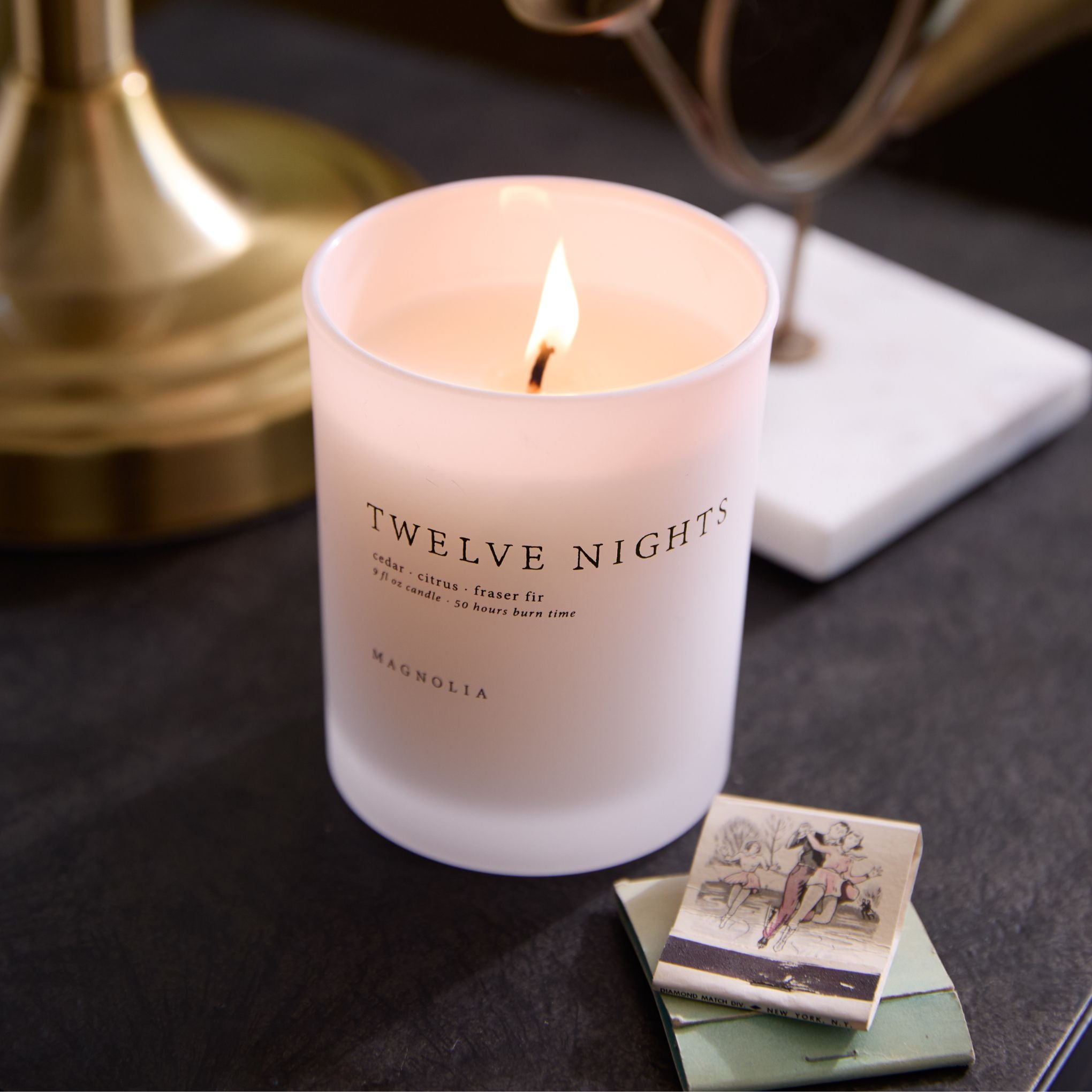 Magnoliass Twelve Nights Candle shown burning