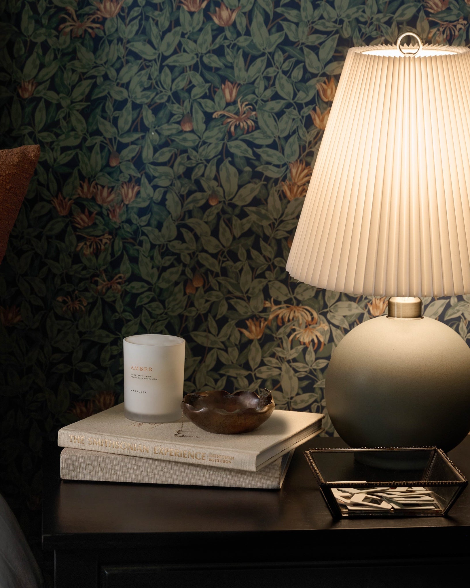 Corrie Accordion Shade Table Lamp on a nightstand