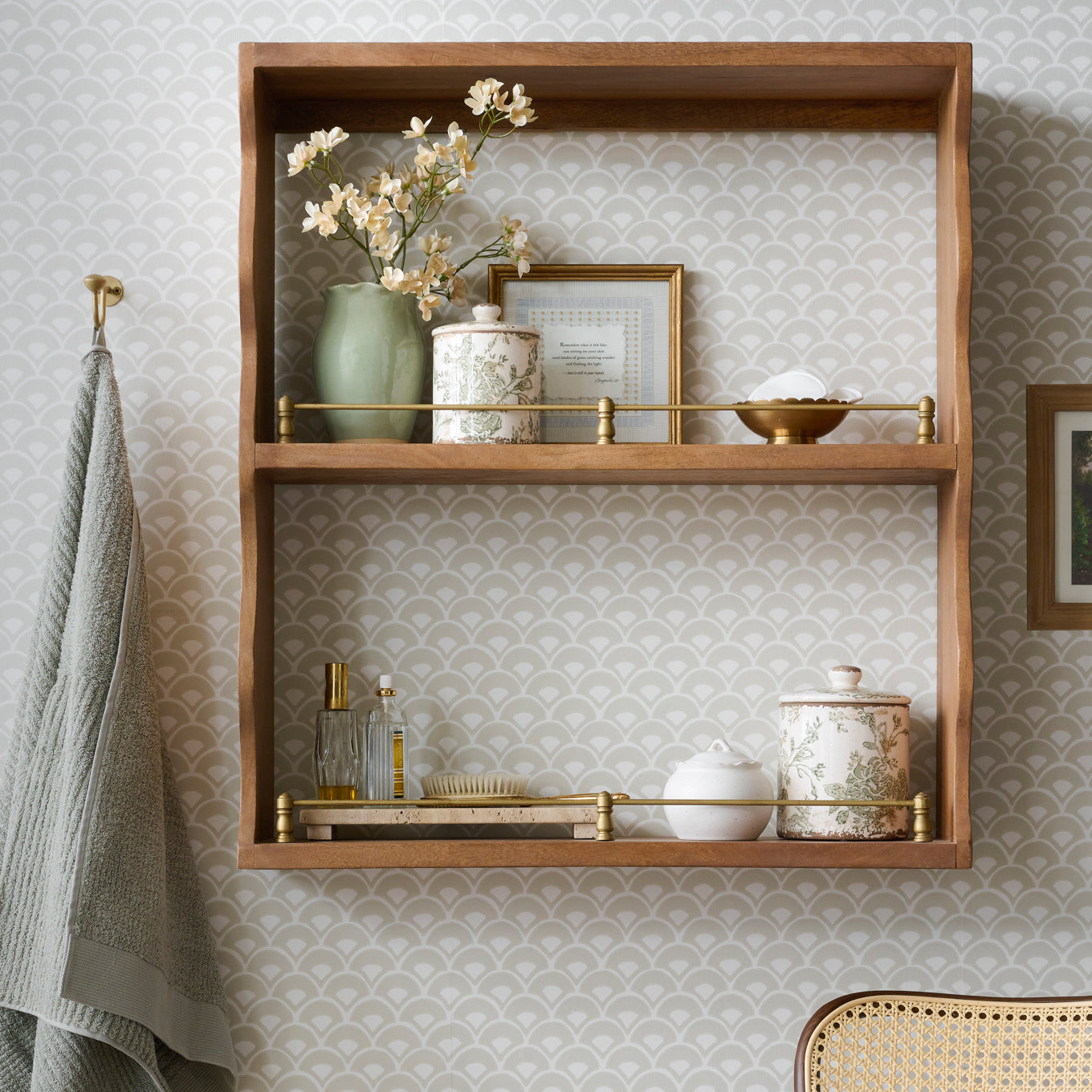 Small Nancy Green Scalloped Ceramic Vase on a shelf in a bathroom