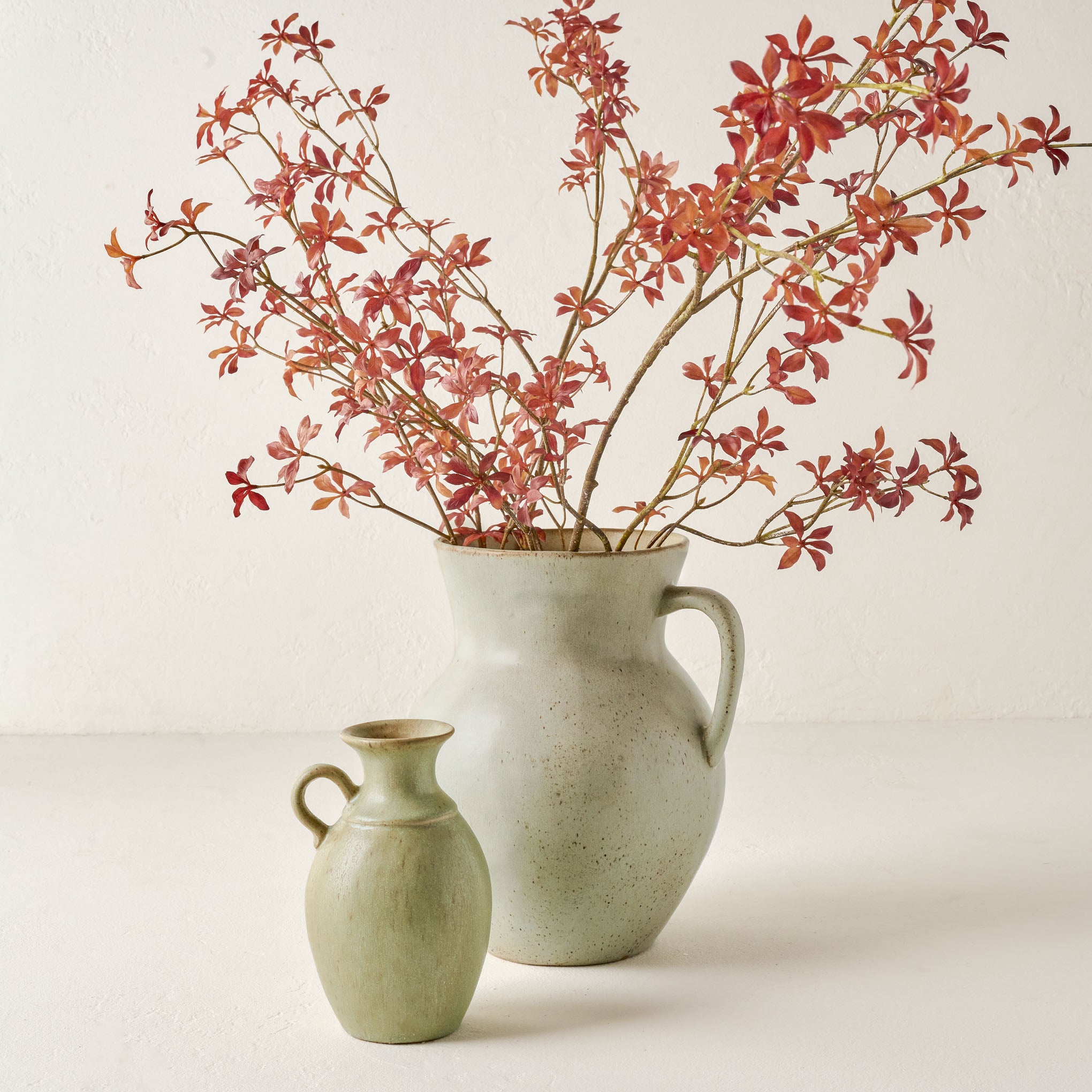 Small and Large Rustic Green Vases shown with florals